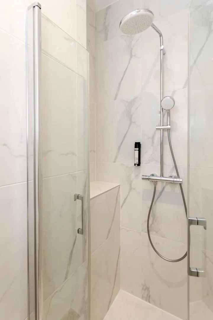 Shower in Reva Suites