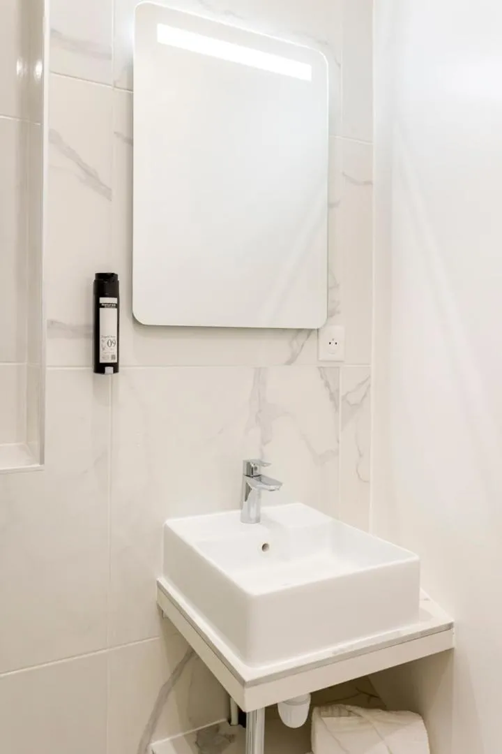 Bathroom in Reva Suites
