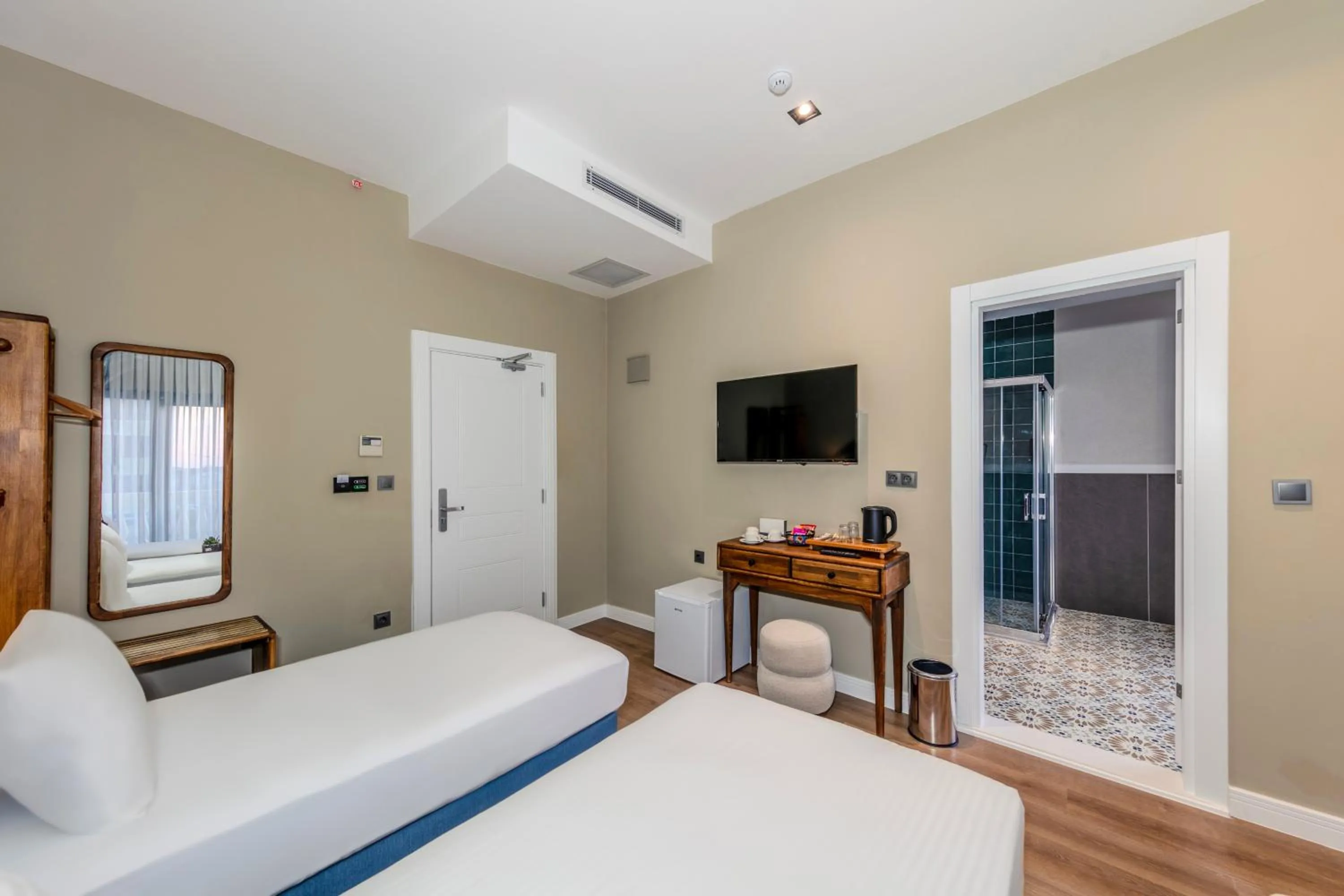 Bed in Nenessa Airport Hotel