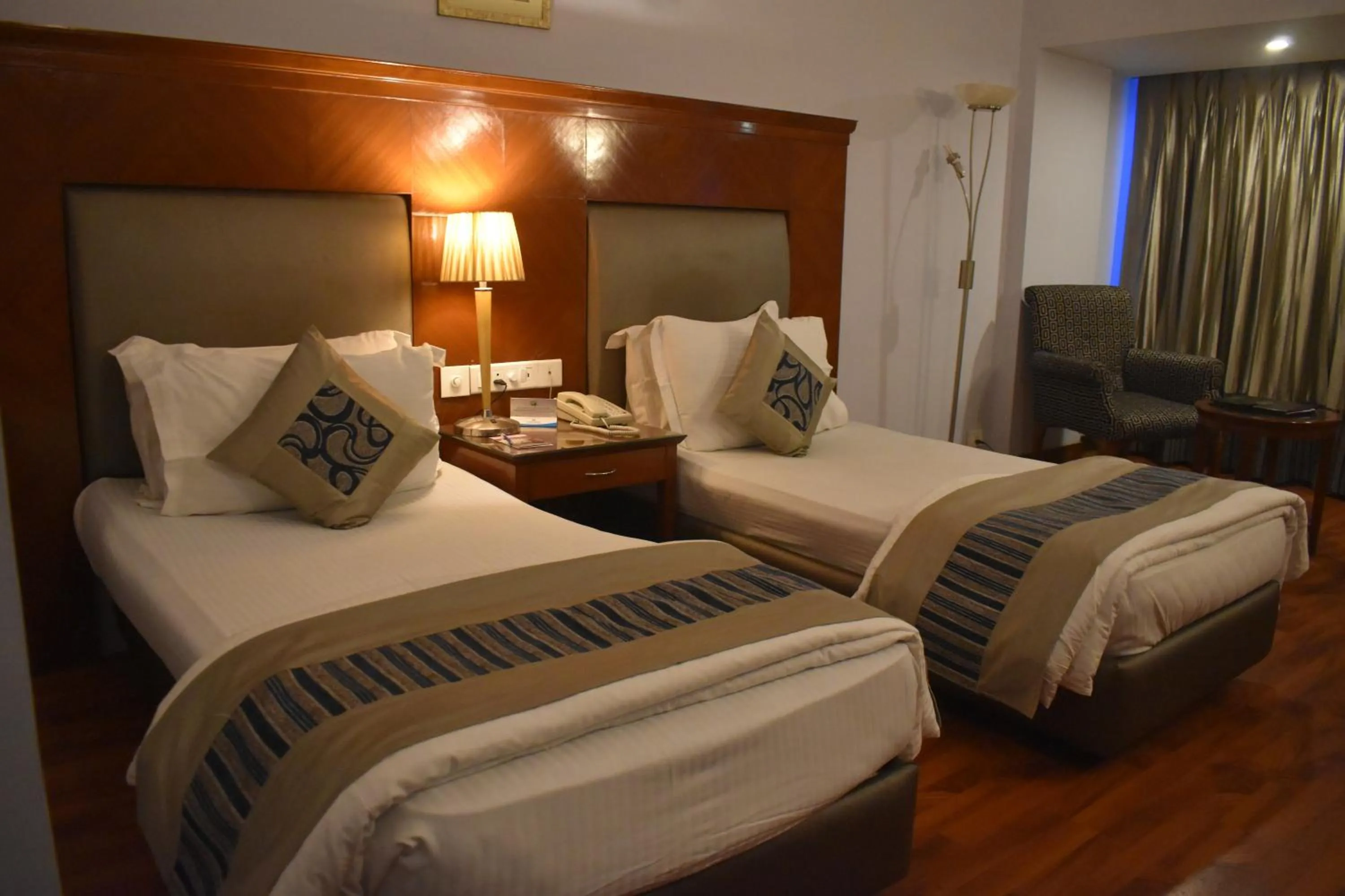 Bed in Chanakya Hotel, Patna