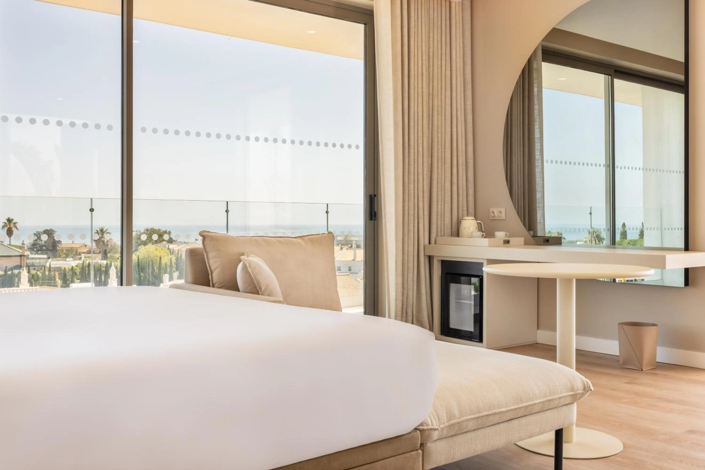 Bed in Castelo Suites Hotel