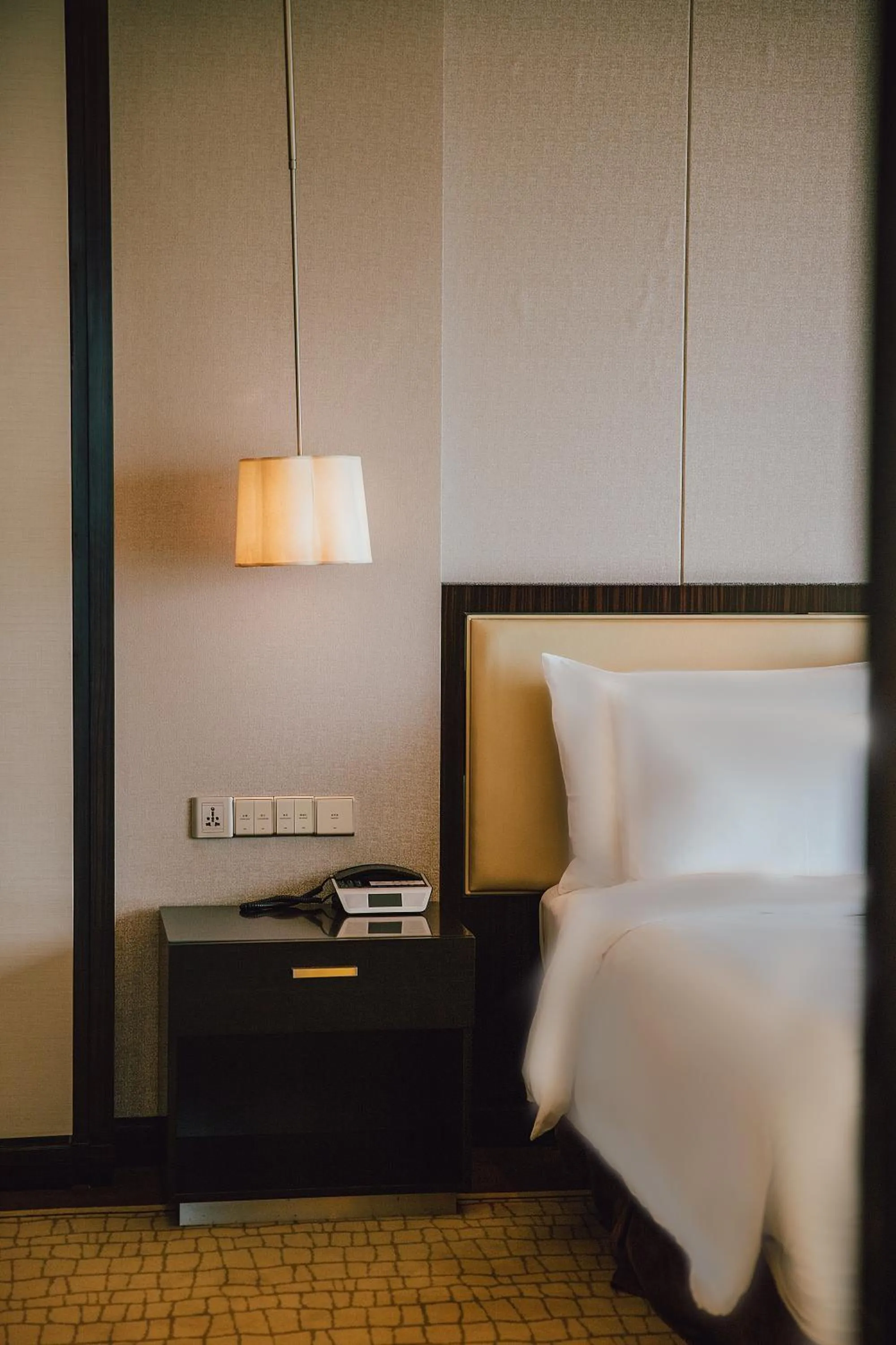 Bed in Junluxe Hotel Guangzhou Zengcheng