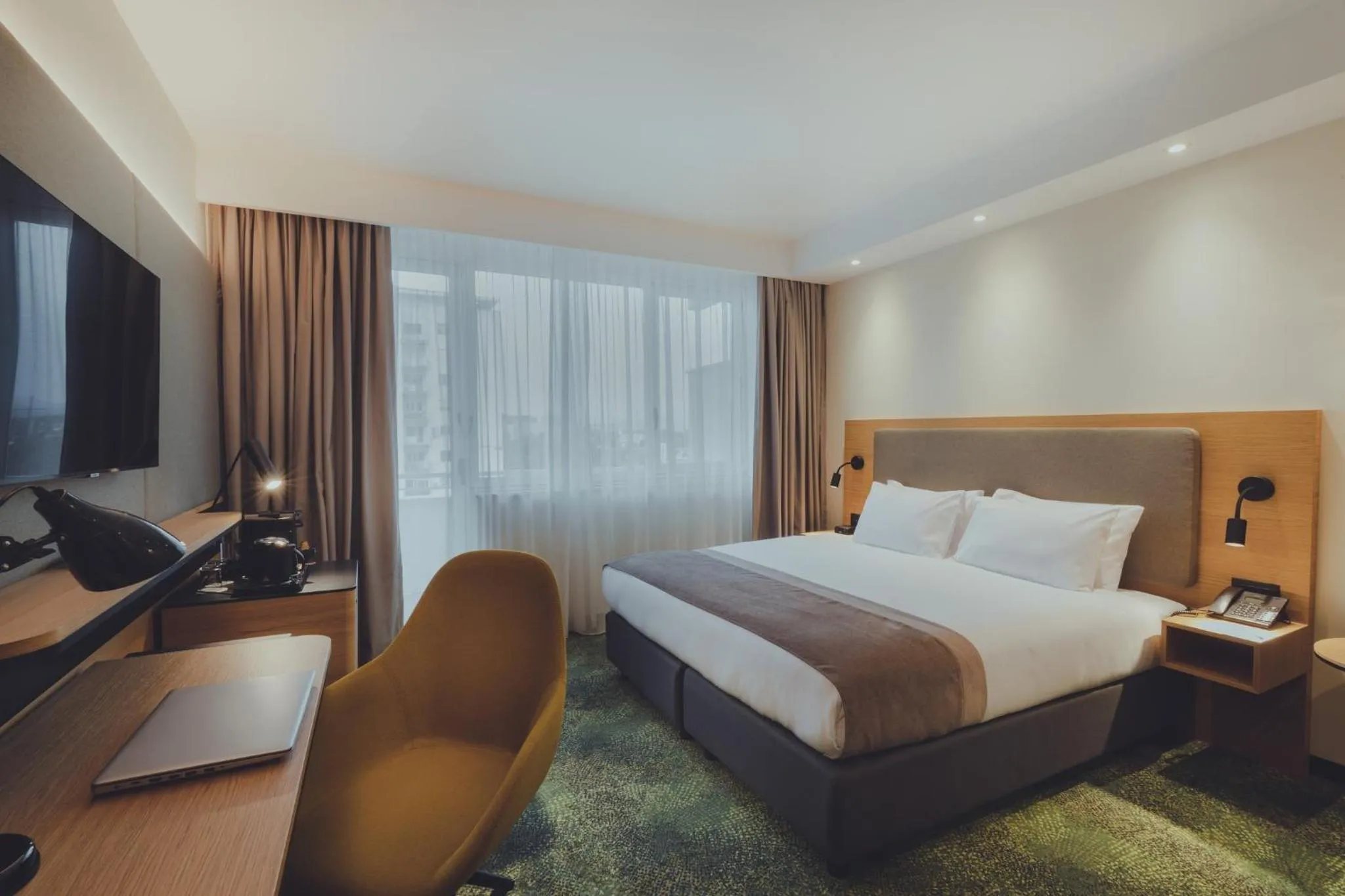 Photo of the whole room, Bed in Holiday Inn Skopje by IHG