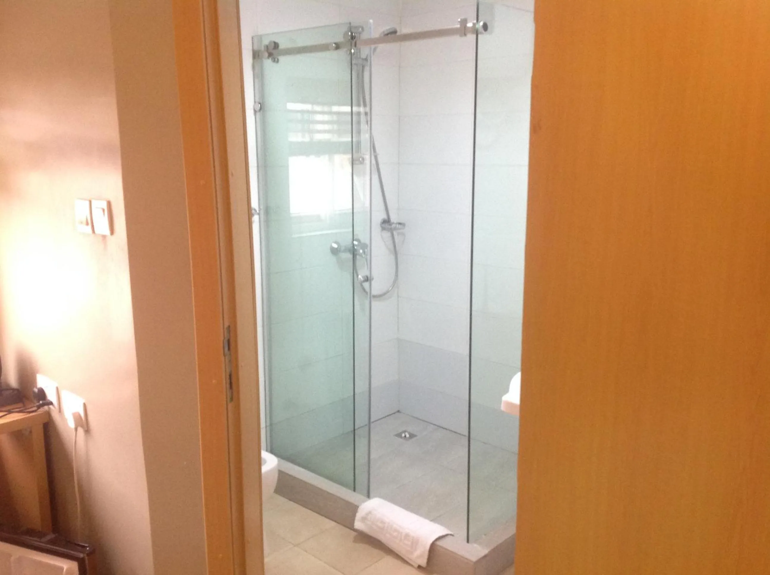 Shower in Adis Hotels Ibadan