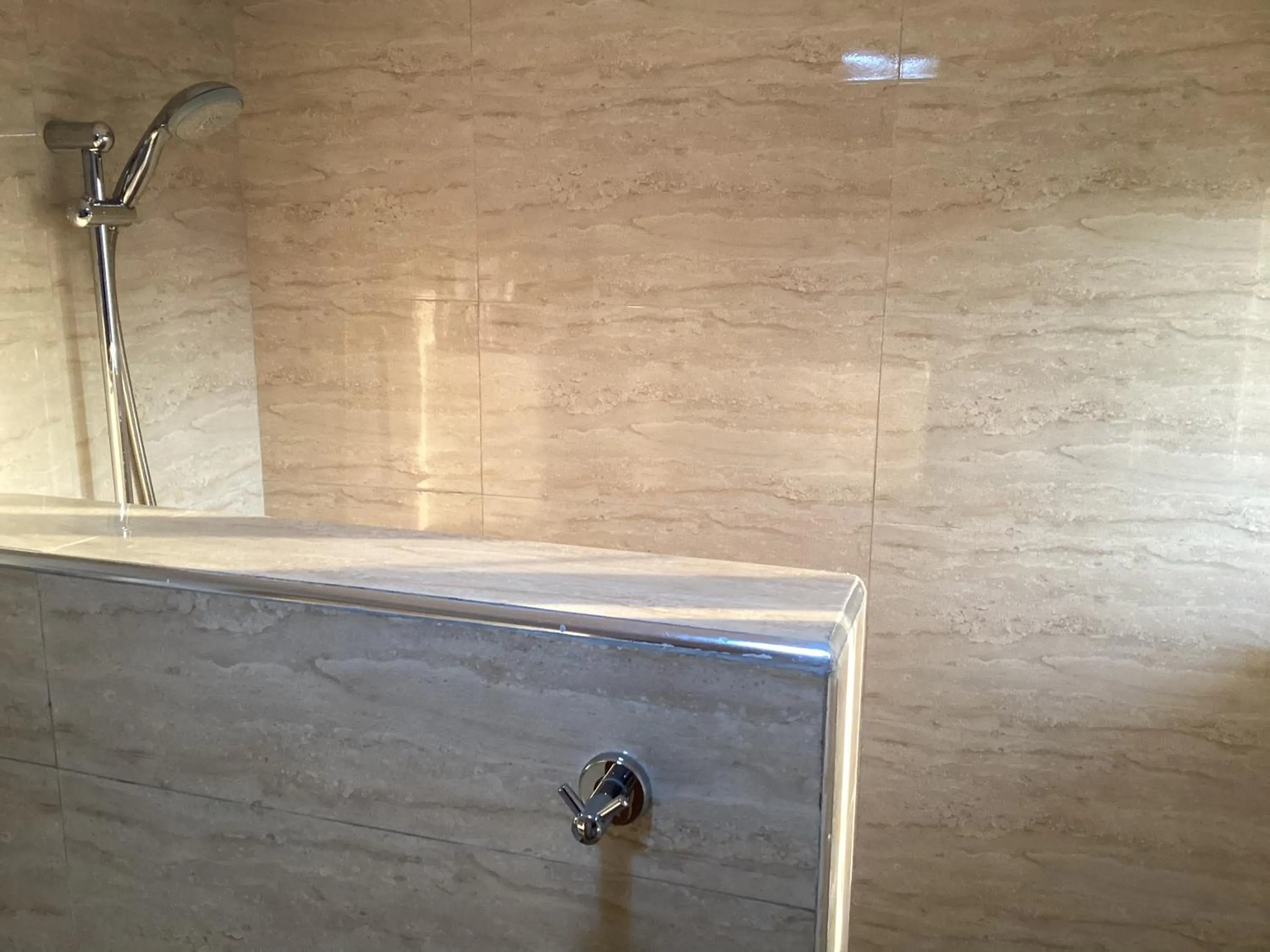 Shower in Adis Hotels Ibadan