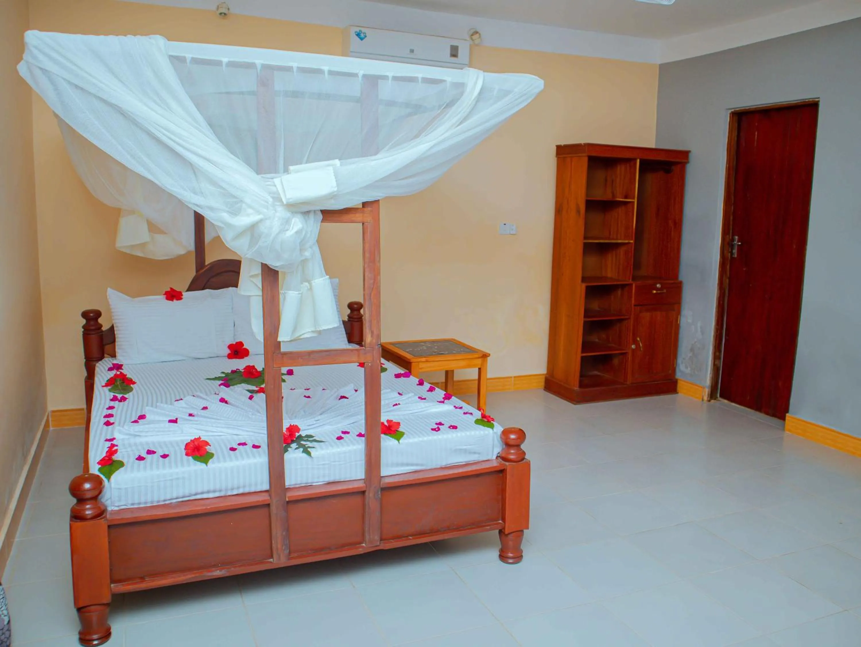 Bed in Tumaini Bungalows