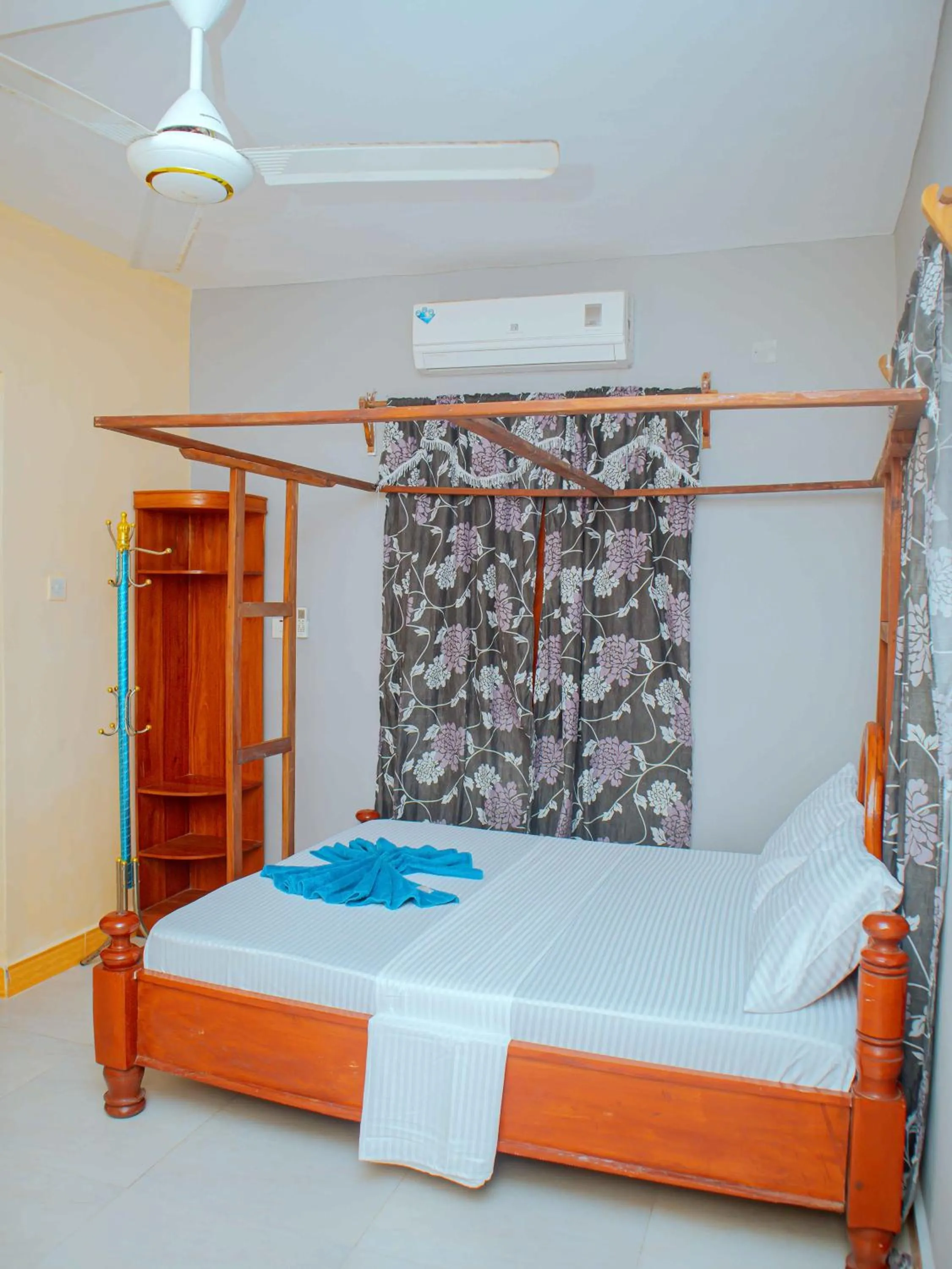 Bed in Tumaini Bungalows