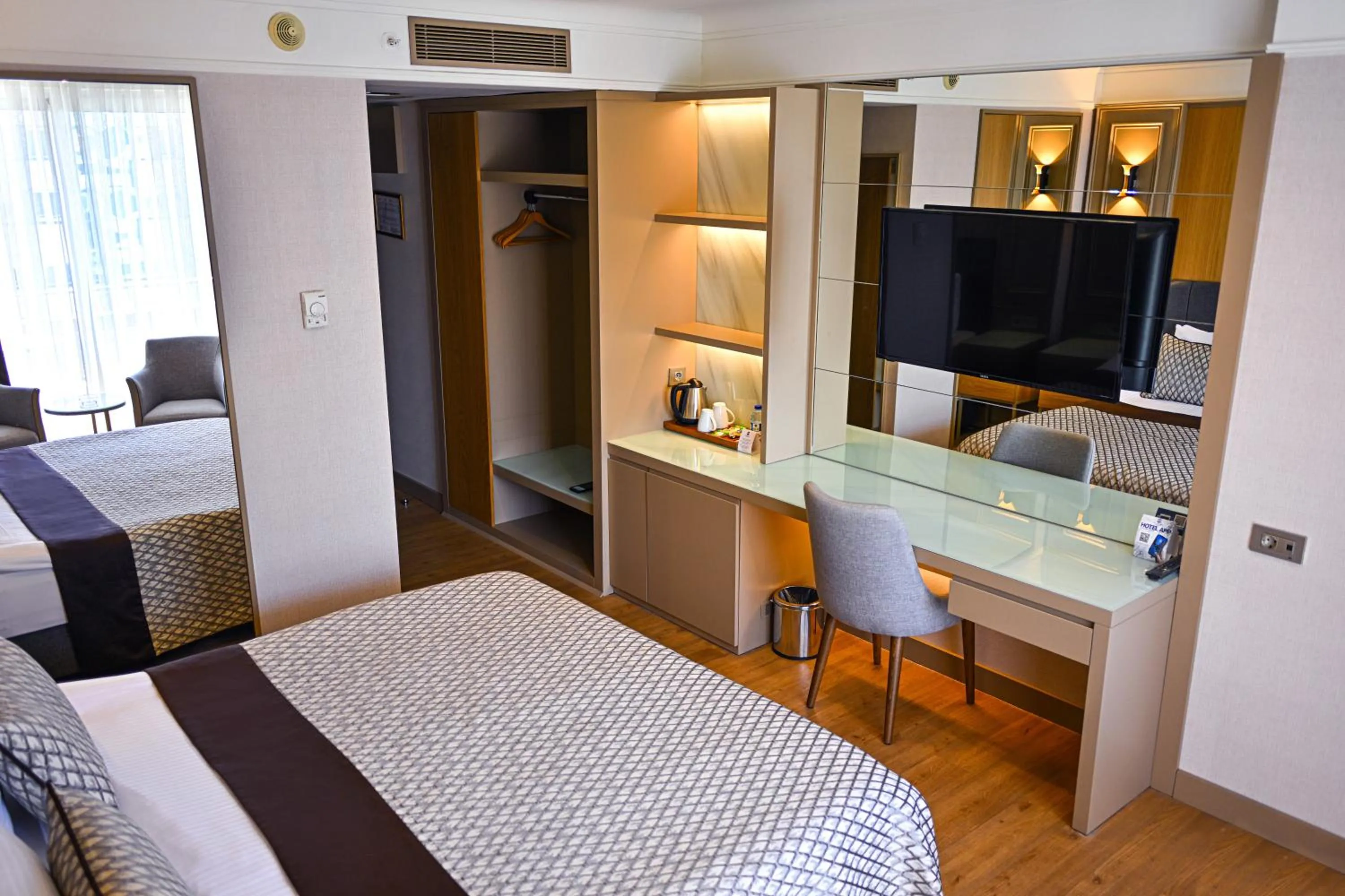 Bed in Porto Bello Hotel Resort & Spa