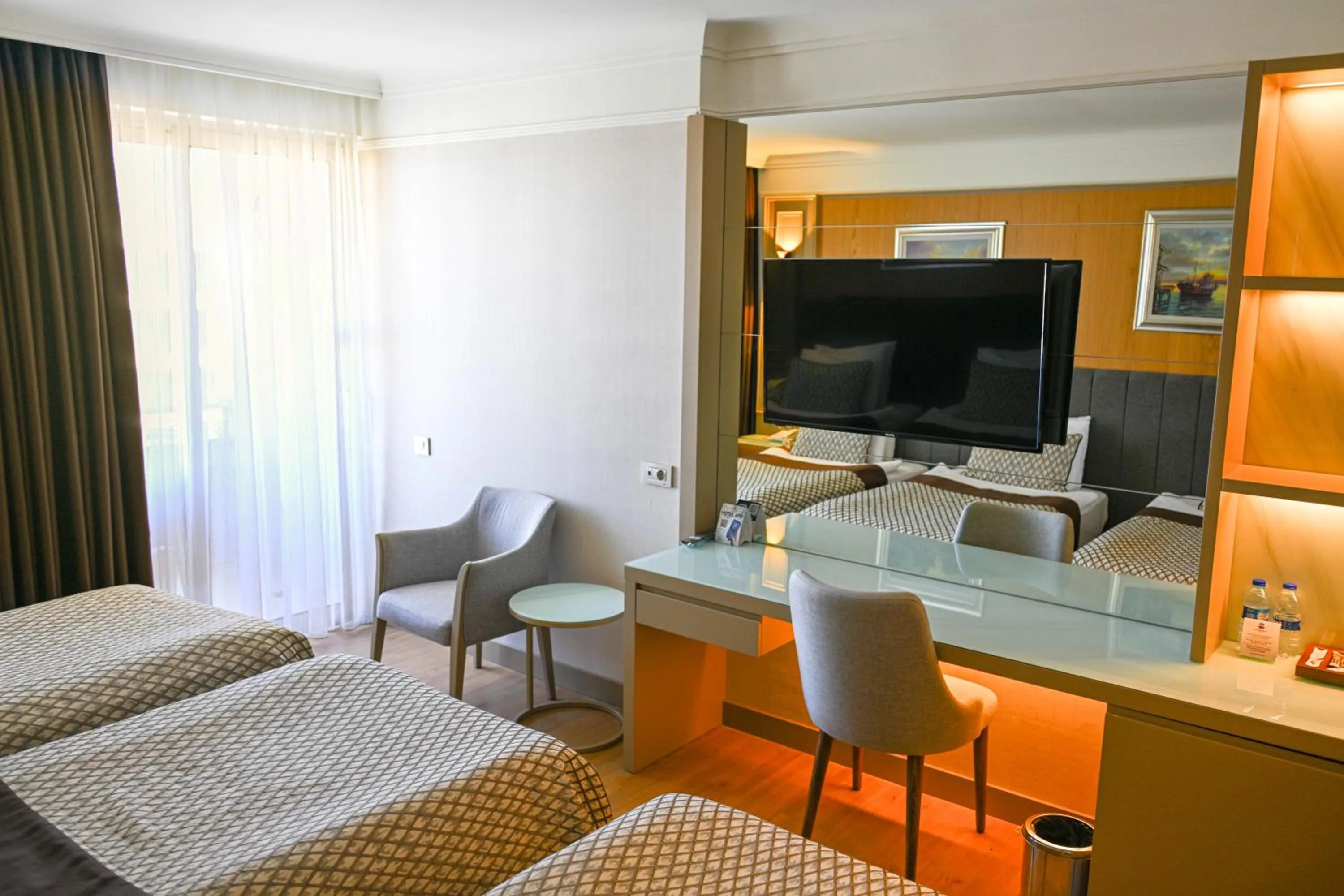 Bed in Porto Bello Hotel Resort & Spa