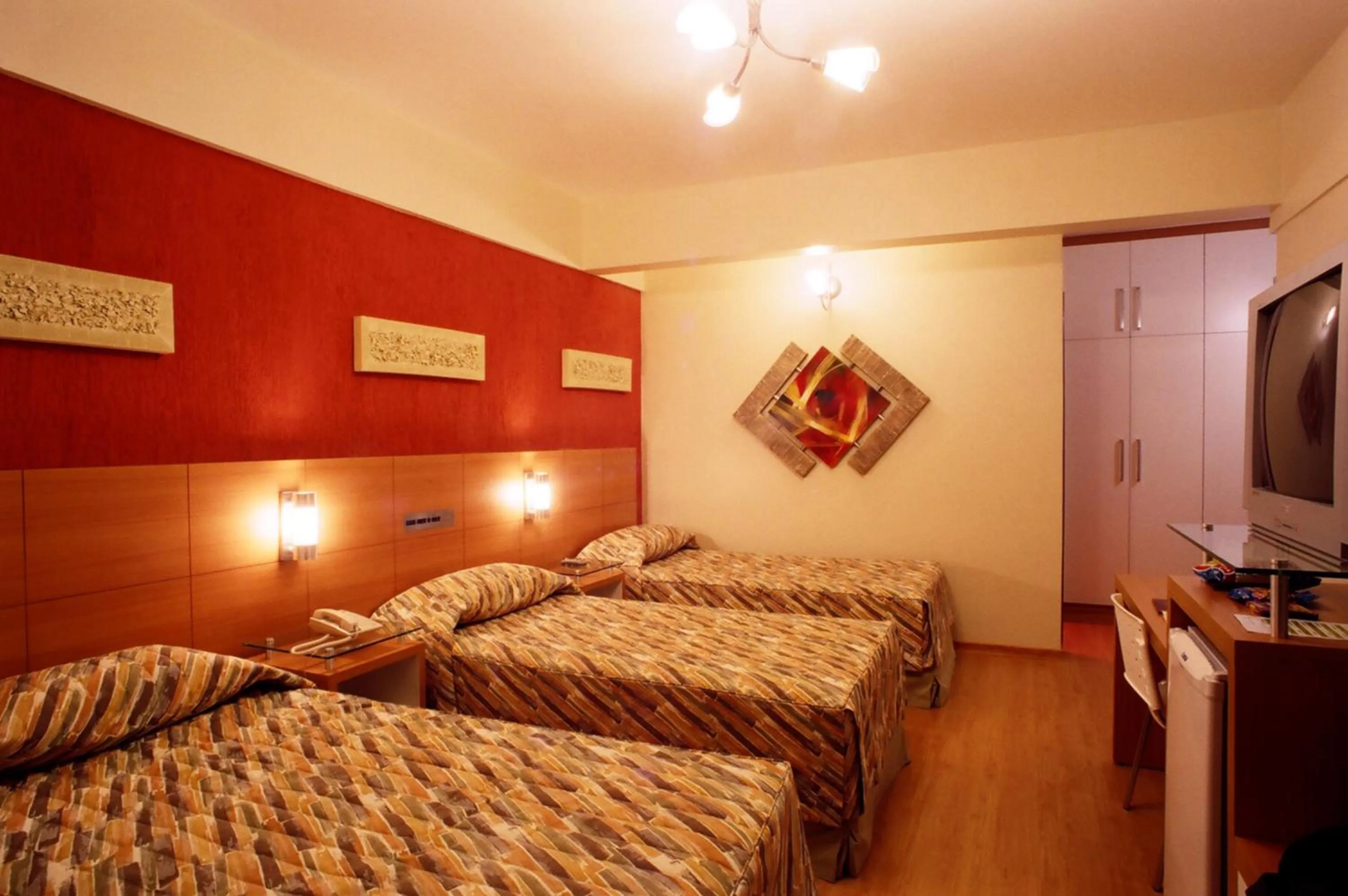 Economy Triple Room in Líber Hotel Nova Serrana - Conforto na Rota da BR-262