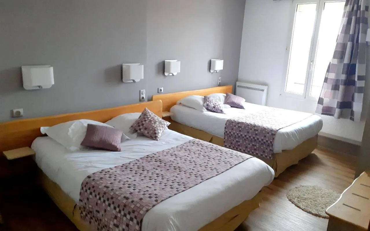 Bed in Logis Le Cheval Rouge