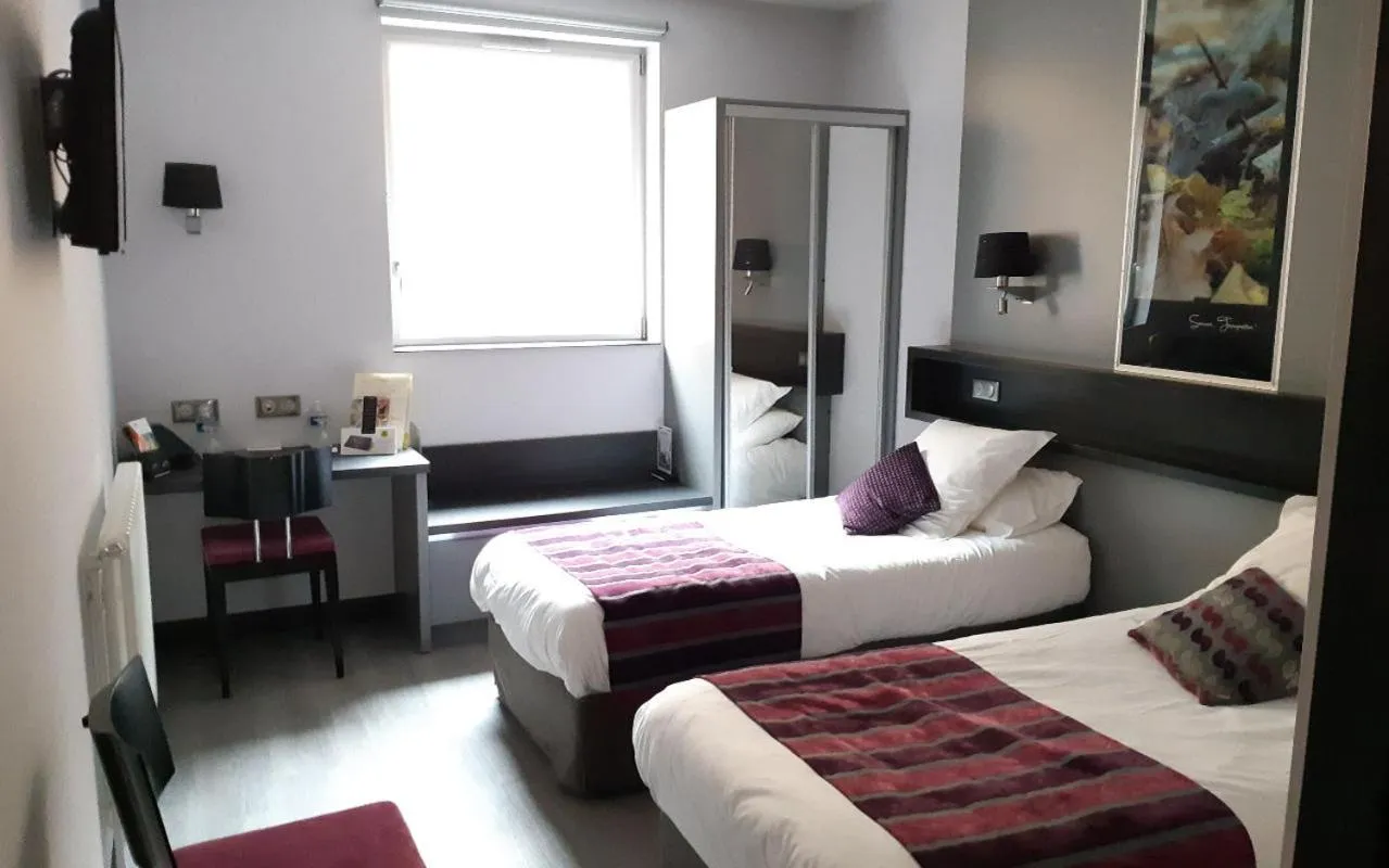 Bed in Logis Le Cheval Rouge