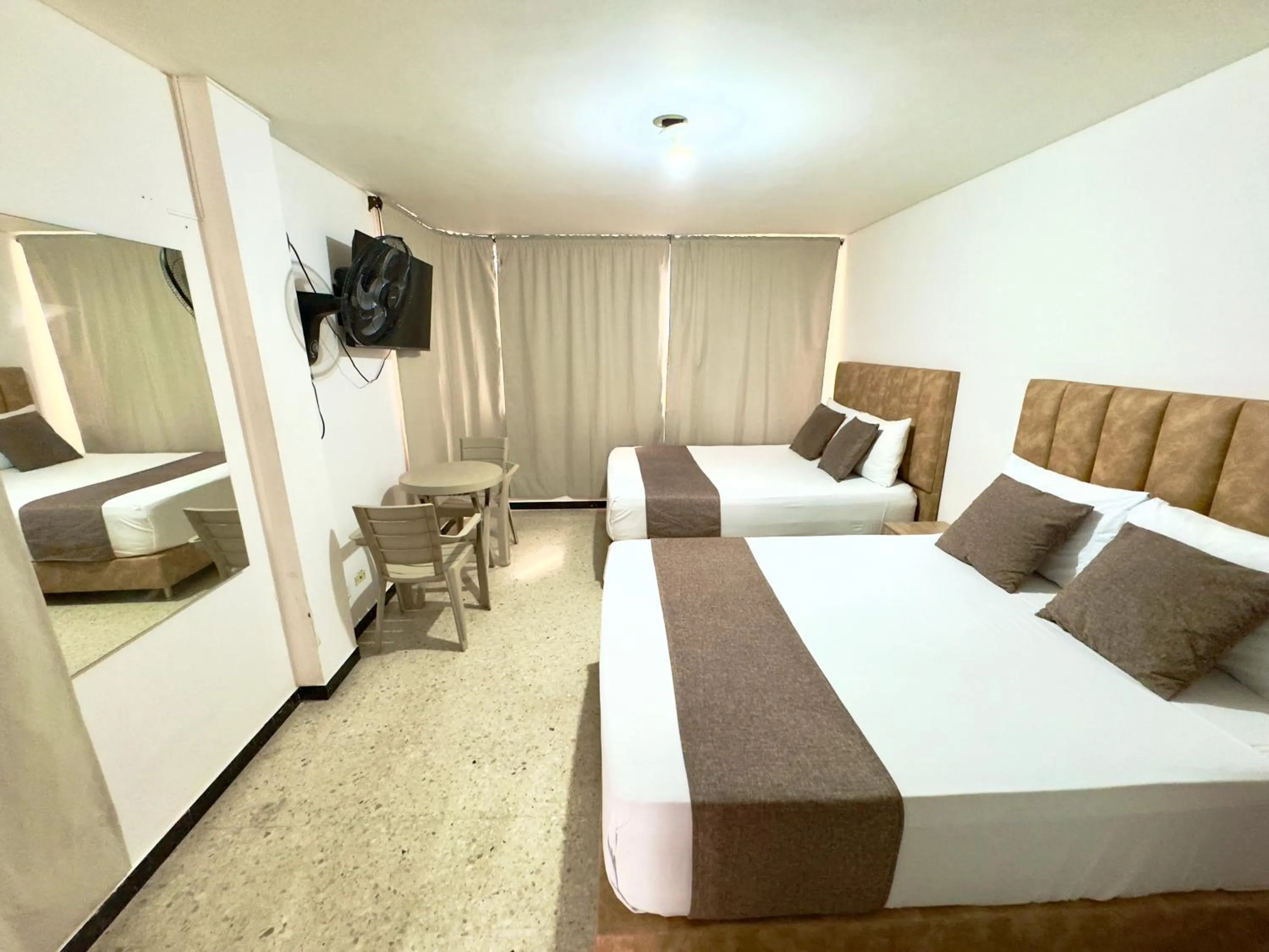 Bed in Hotel Pereira Central