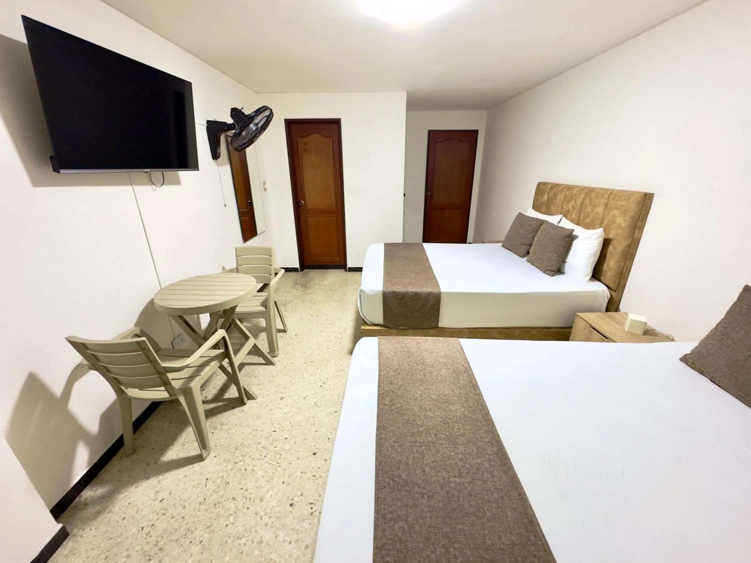 Bed in Hotel Pereira Central