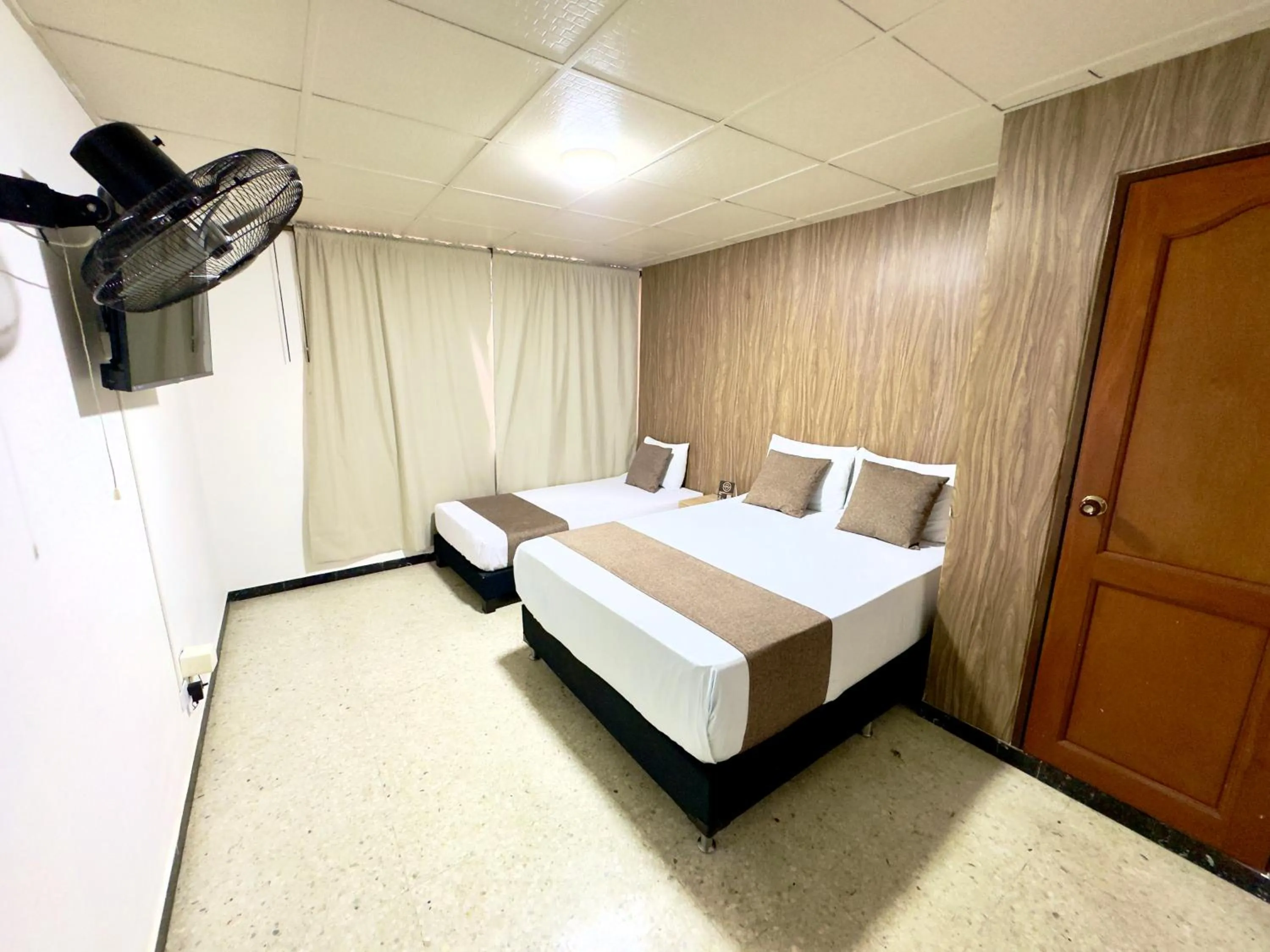 Bed in Hotel Pereira Central