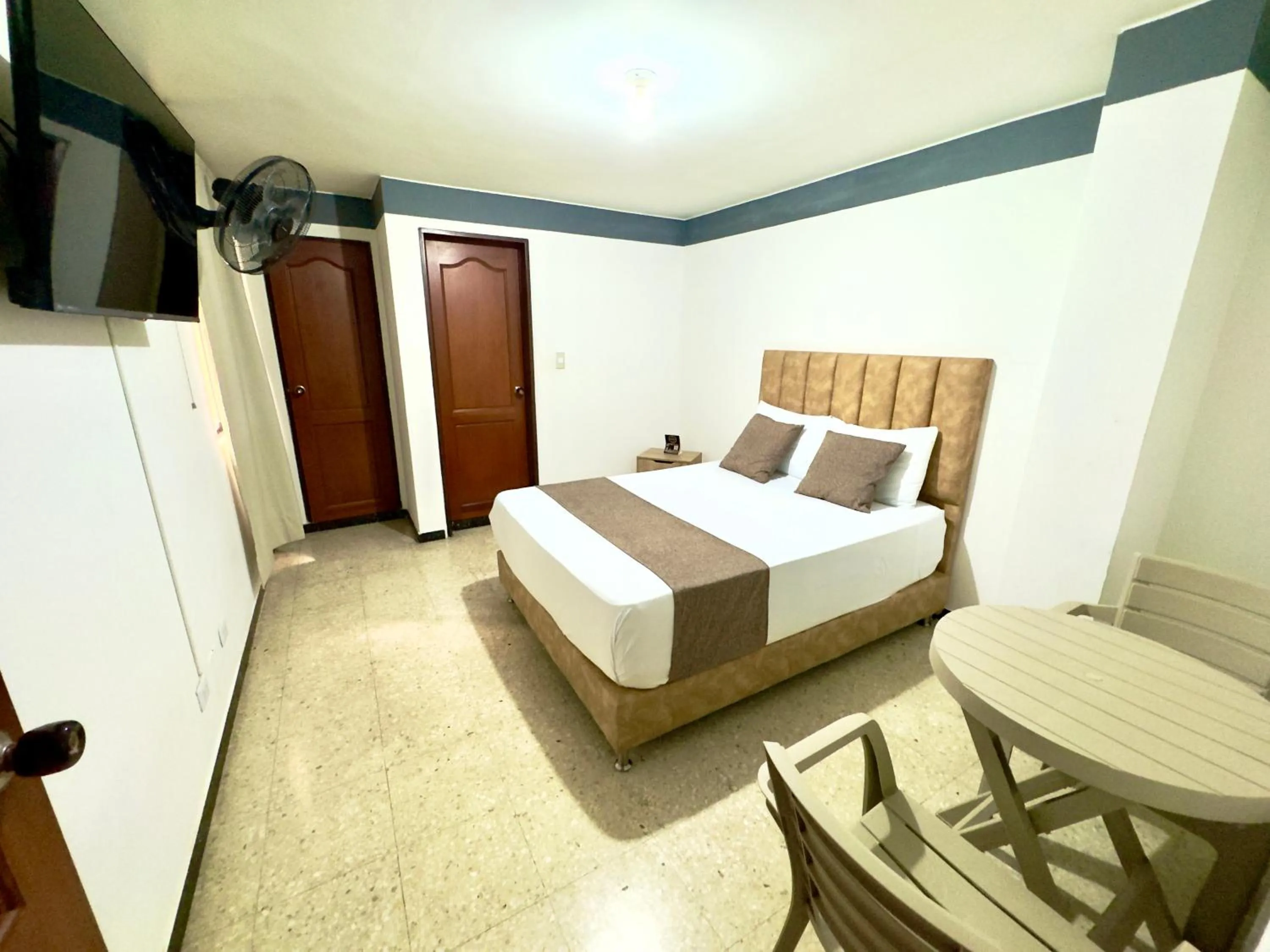 Bed in Hotel Pereira Central