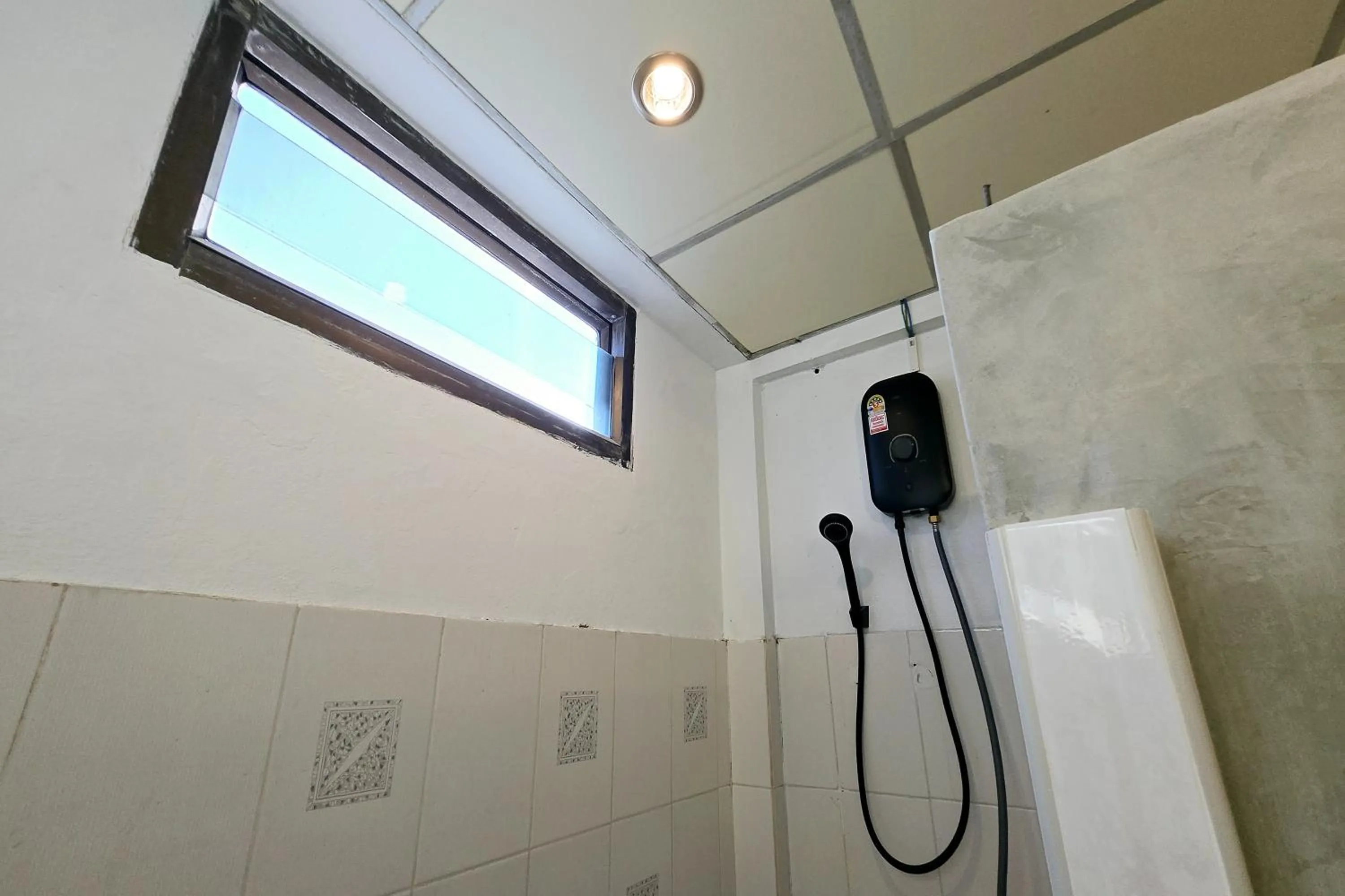 Shower in MT Friend Home & Hostel