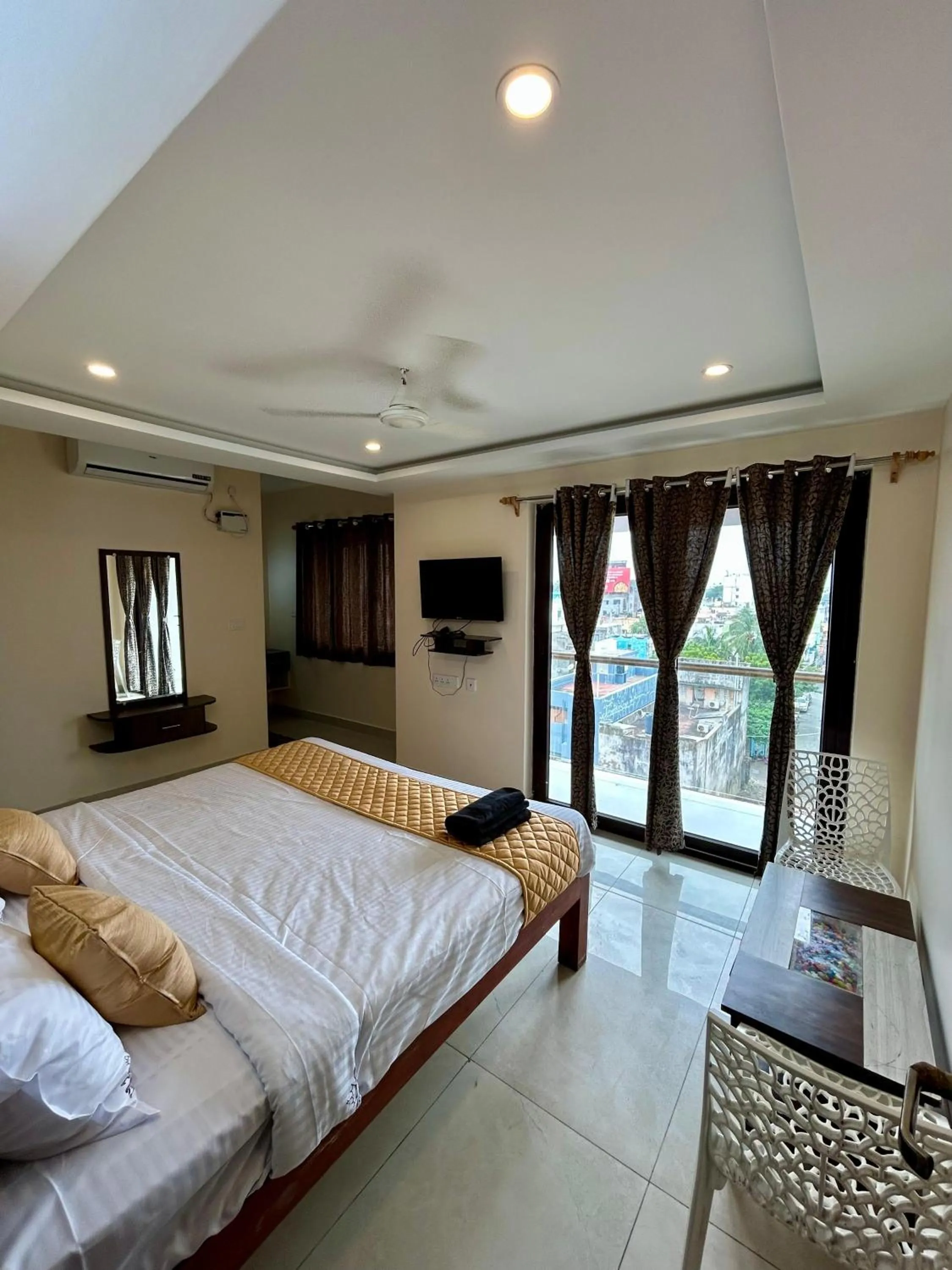 Bedroom in Sri Saai Surguru Residency