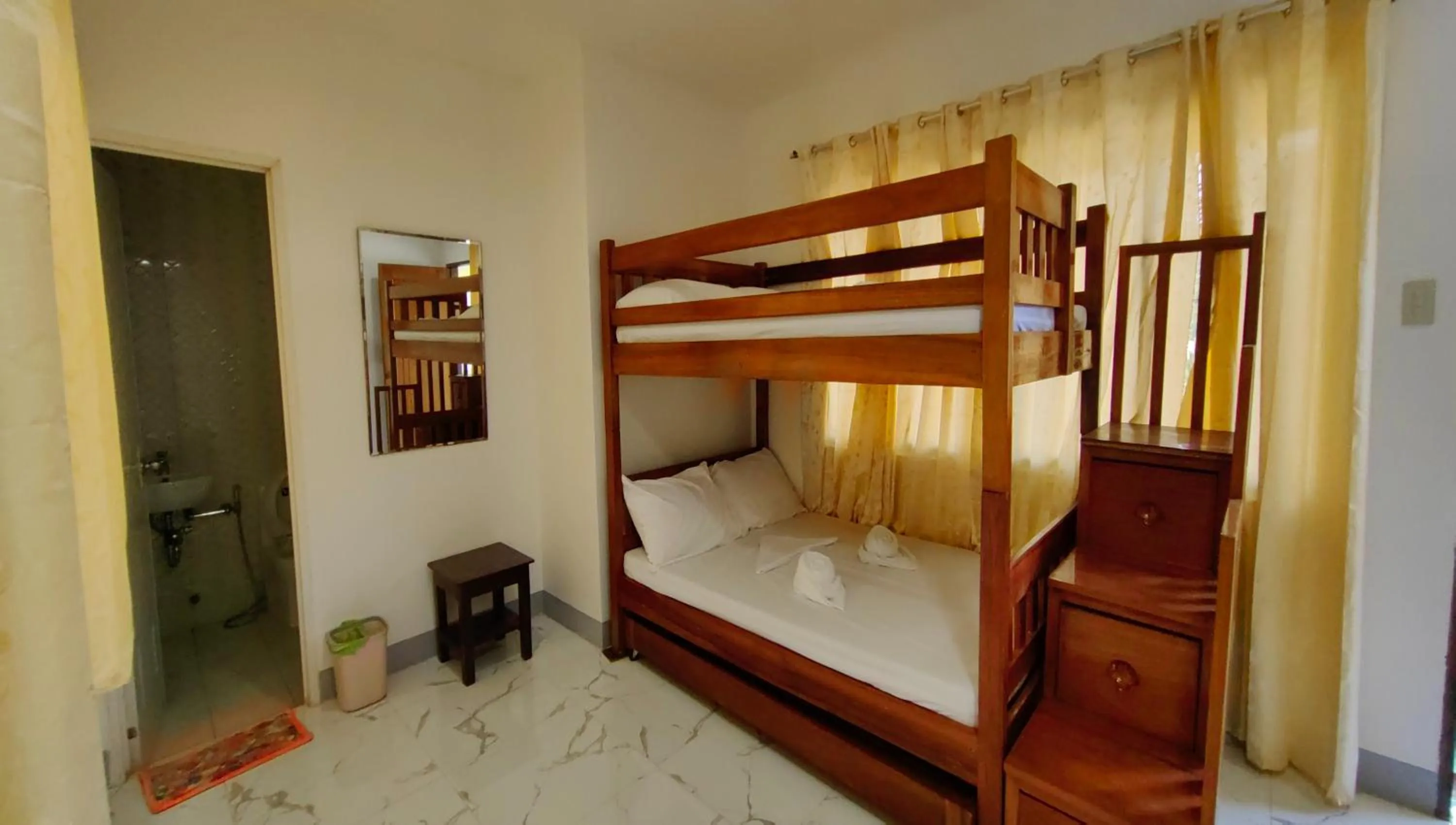 Photo of the whole room, Bed in Pring Pension House Puerto Princesa
