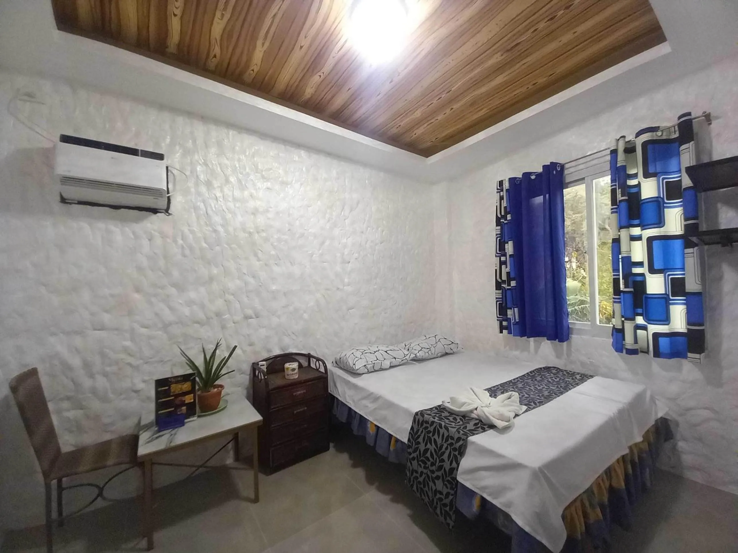 Bedroom in OYO 1130 Thrivers Hometel