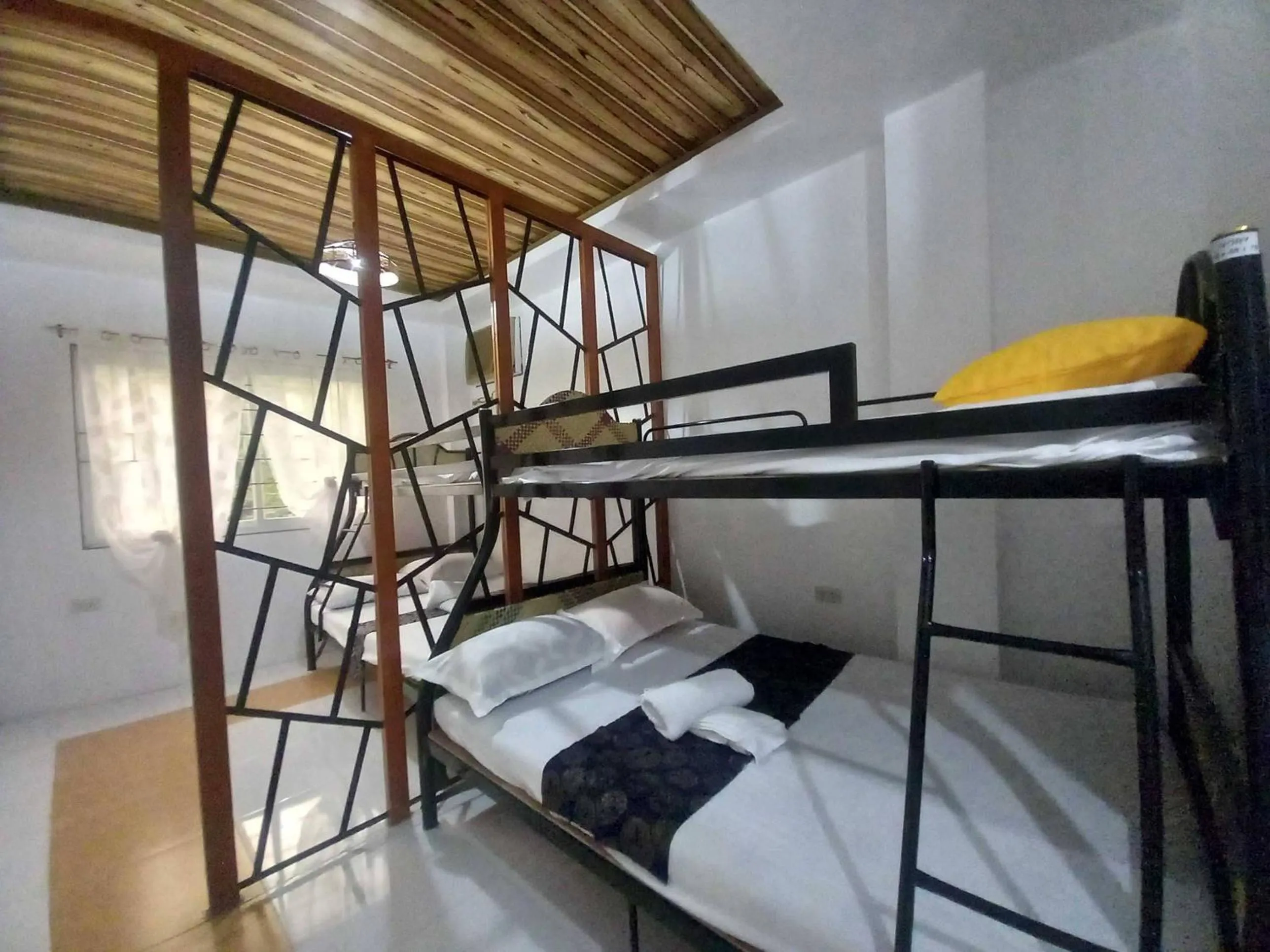 Bedroom in OYO 1130 Thrivers Hometel