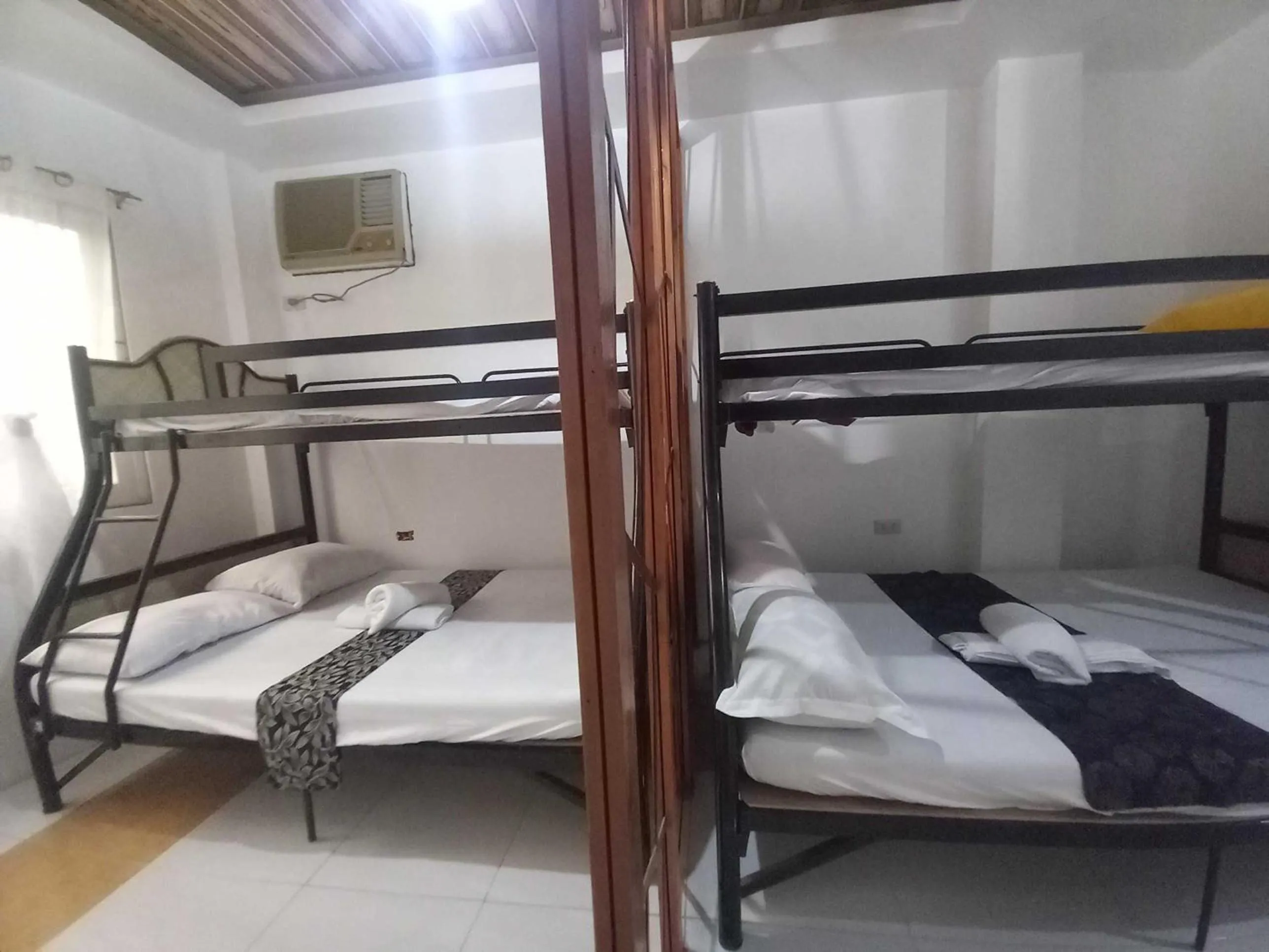 Bedroom in OYO 1130 Thrivers Hometel