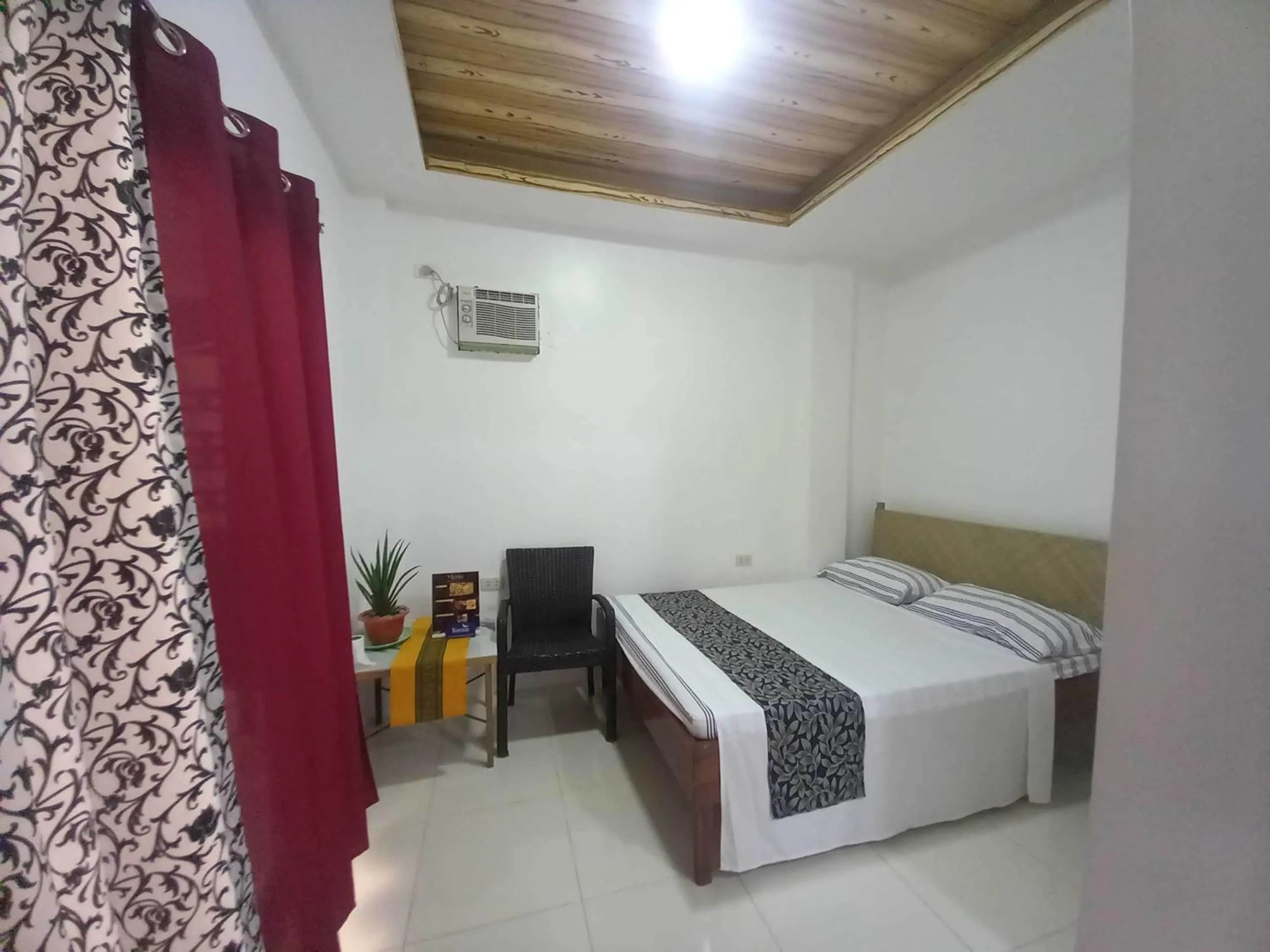Bedroom in OYO 1130 Thrivers Hometel