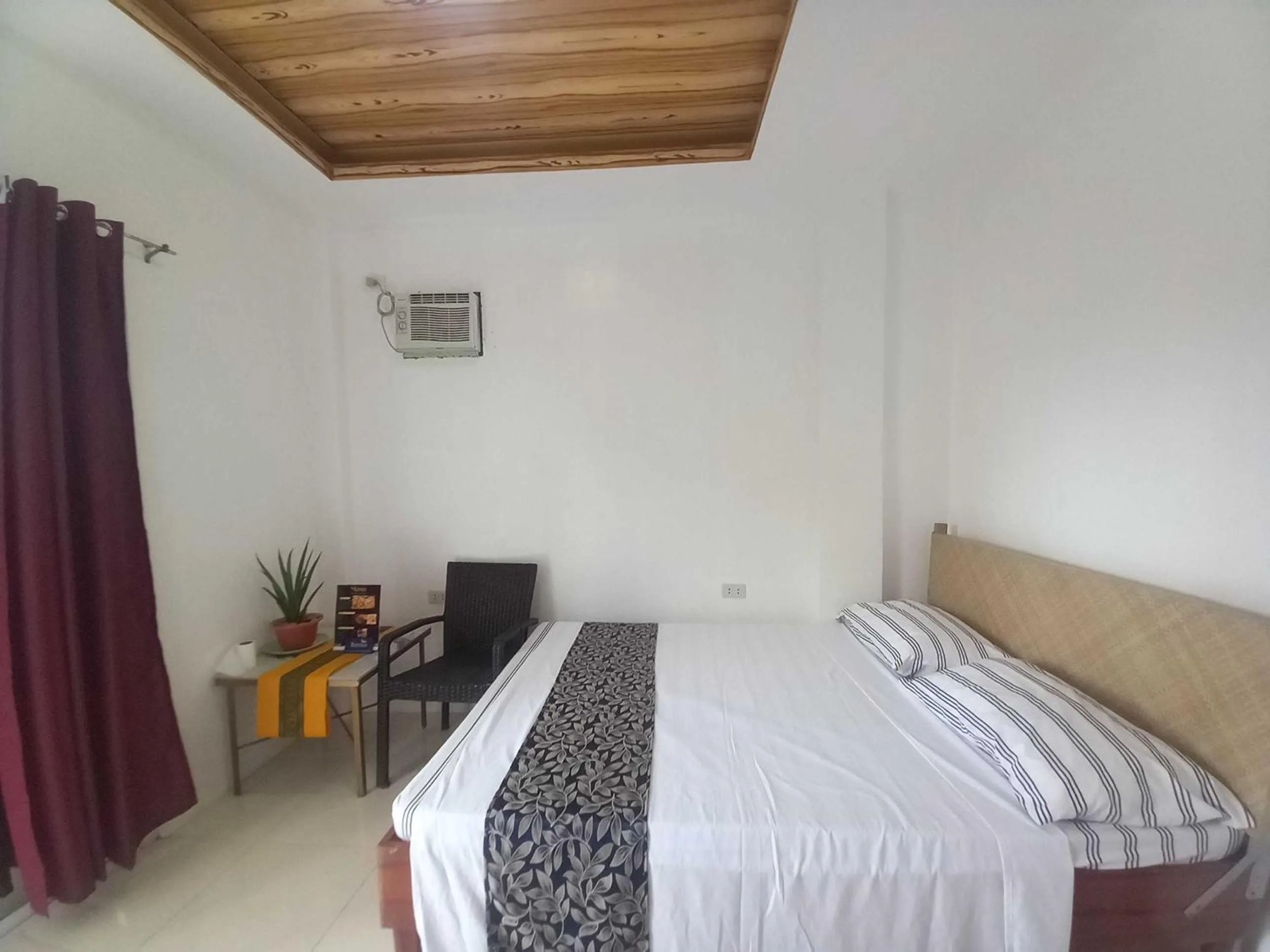 Bedroom in OYO 1130 Thrivers Hometel