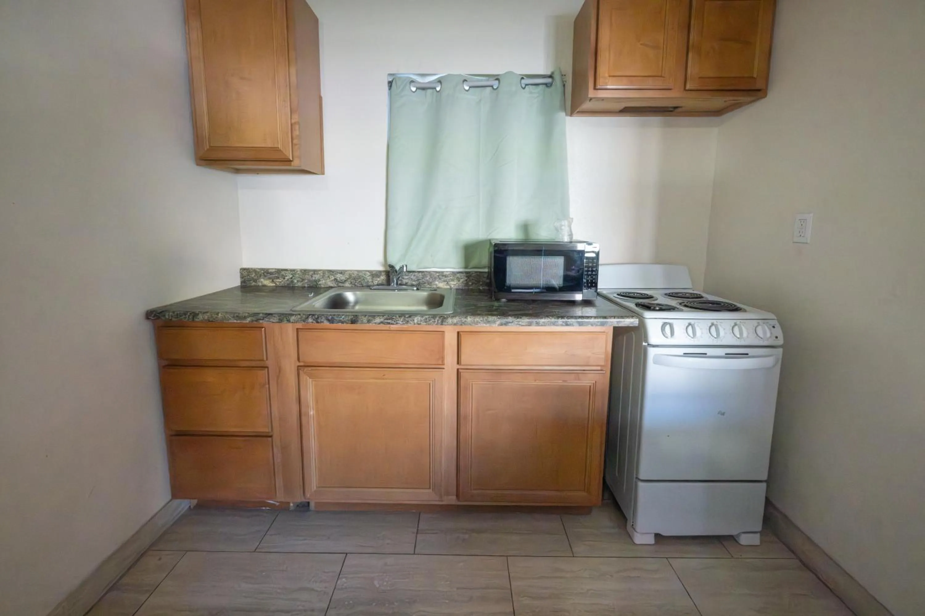 kitchen in Motel 7 By OYO Near Phoenix Airport