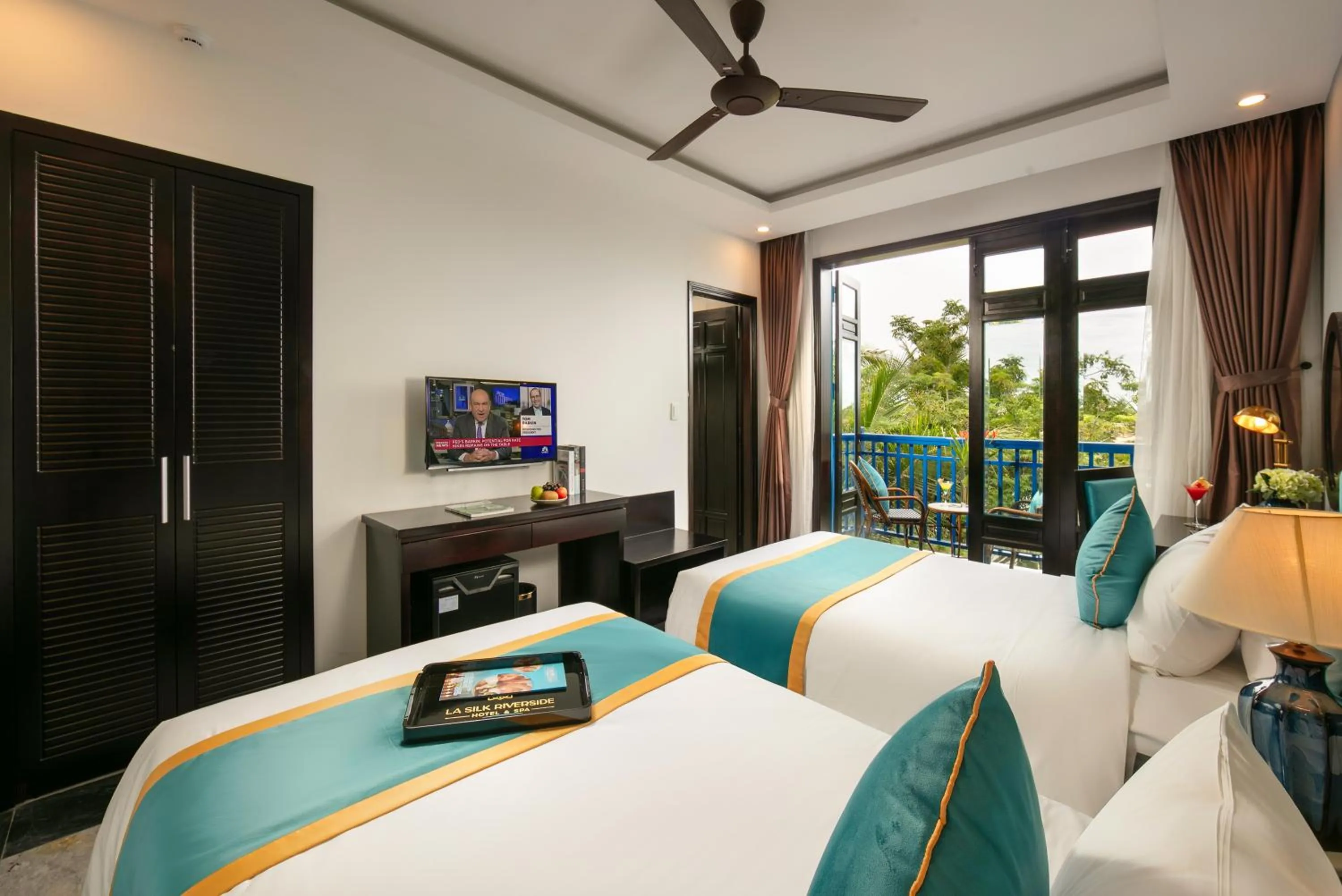 Bed in Silk River Hoi An Hotel & Spa