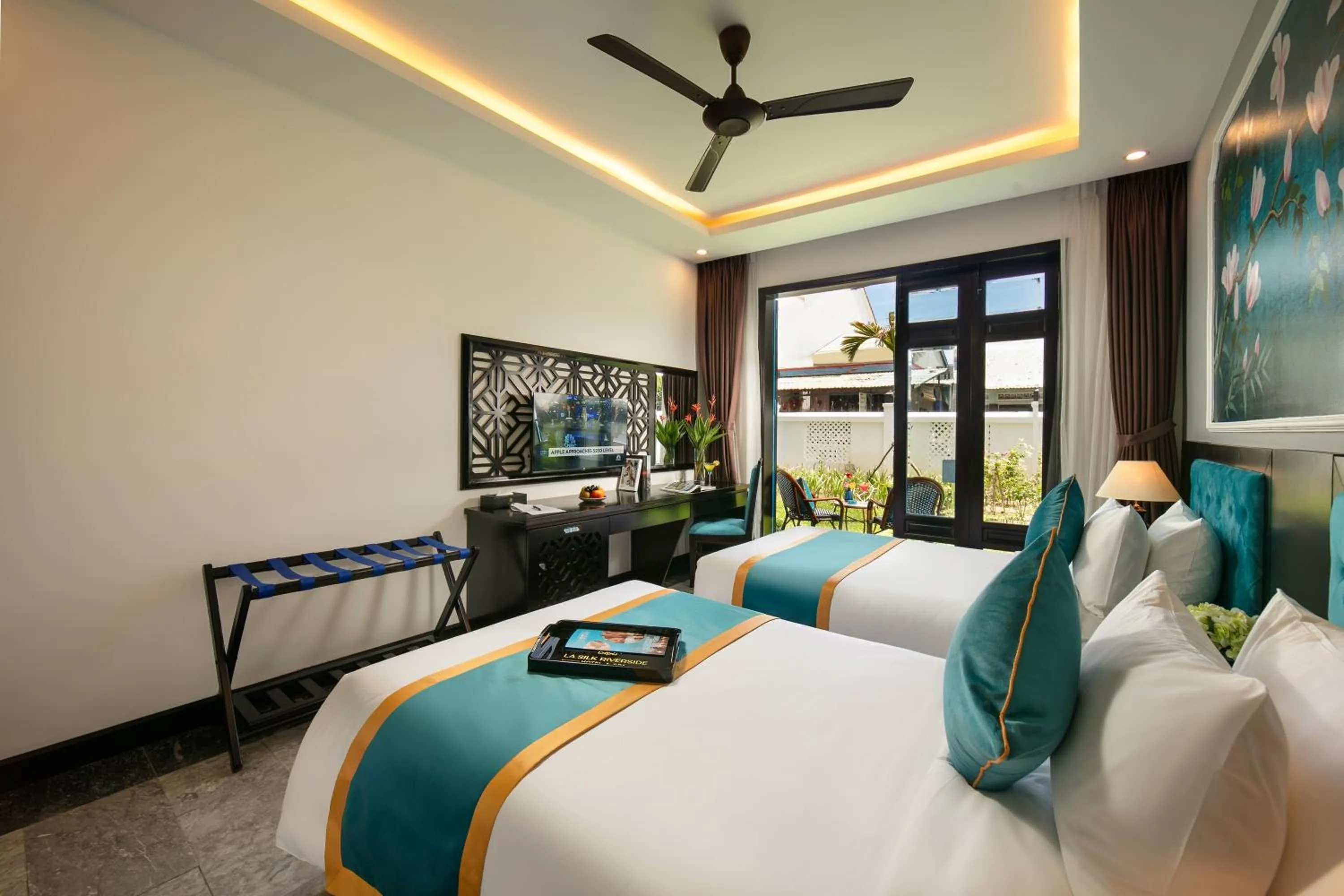 Bed in Silk River Hoi An Hotel & Spa