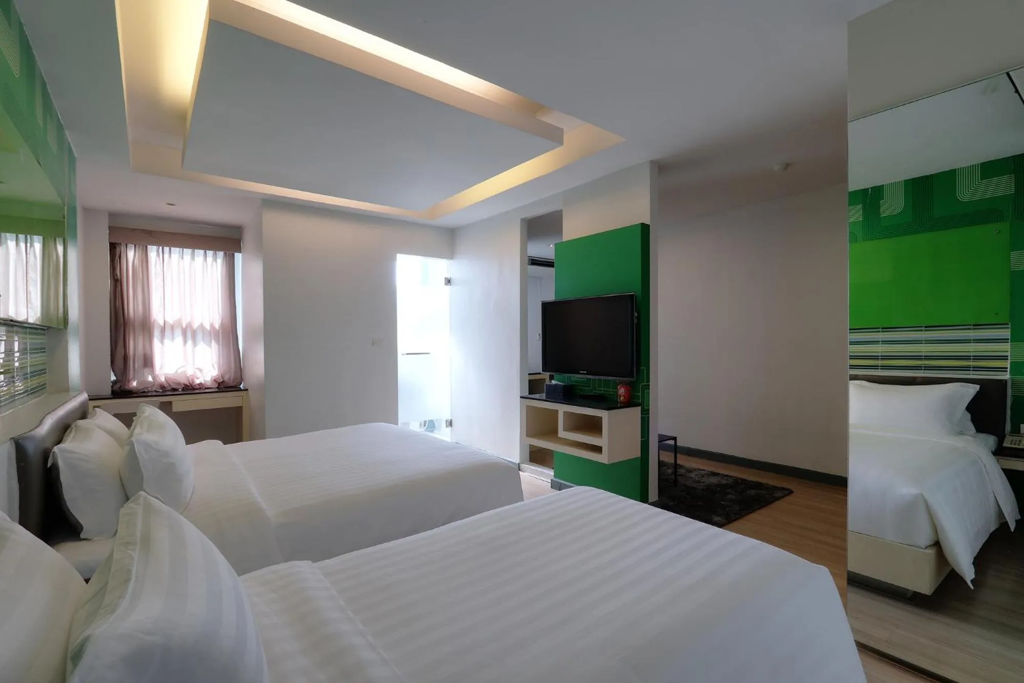 Photo of the whole room, Bed in Klassique Sukhumvit Hotel