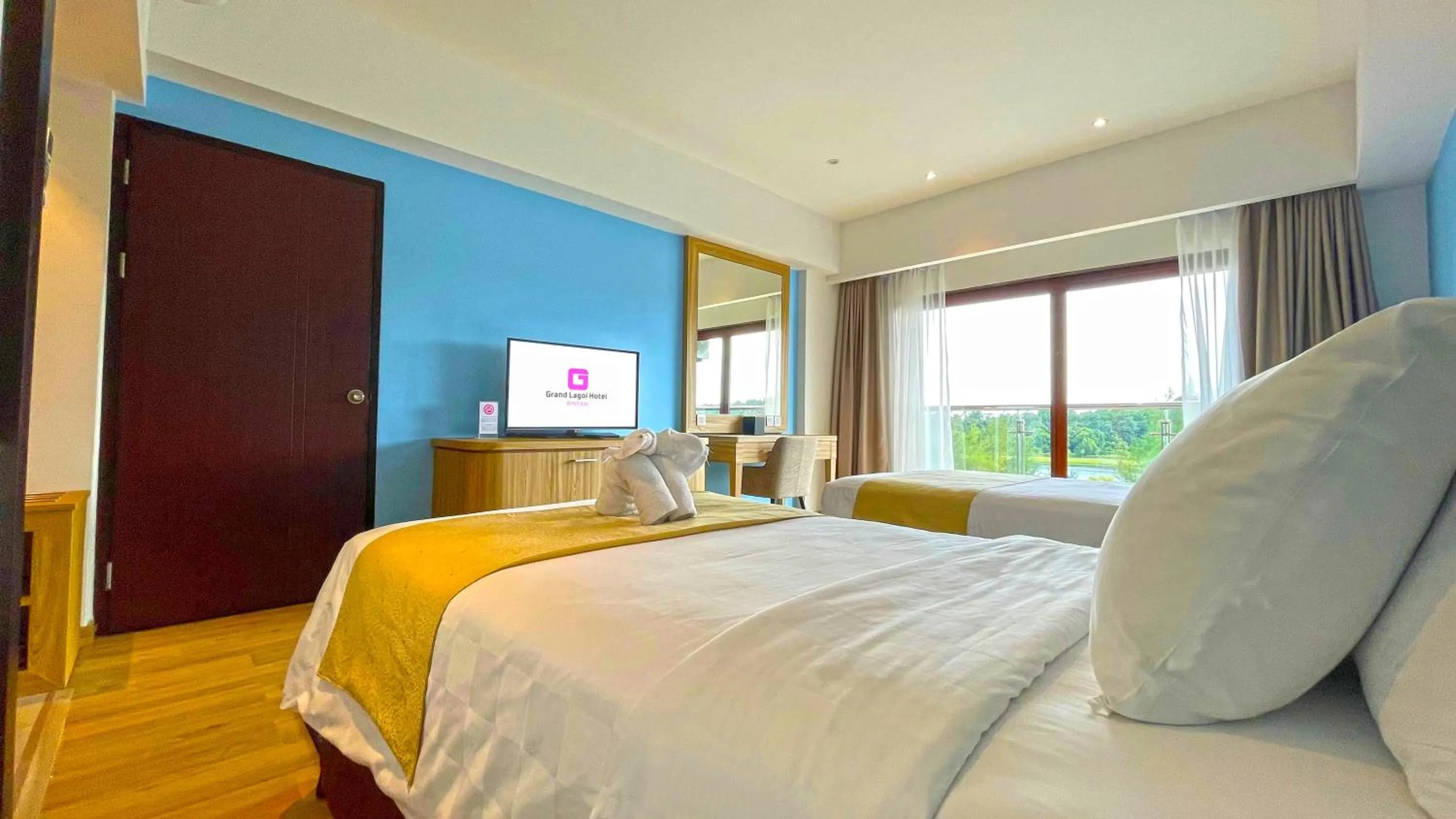 Bed in Grand Lagoi Hotel Bintan