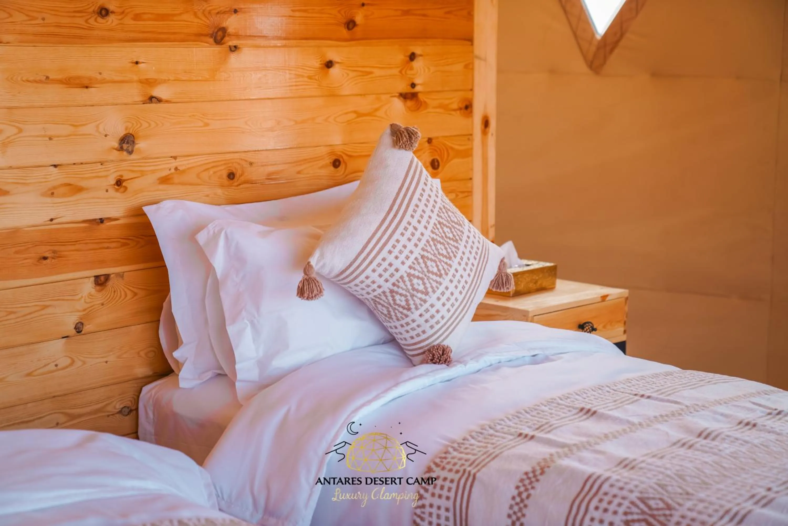 Bed in Antares Desert Camp