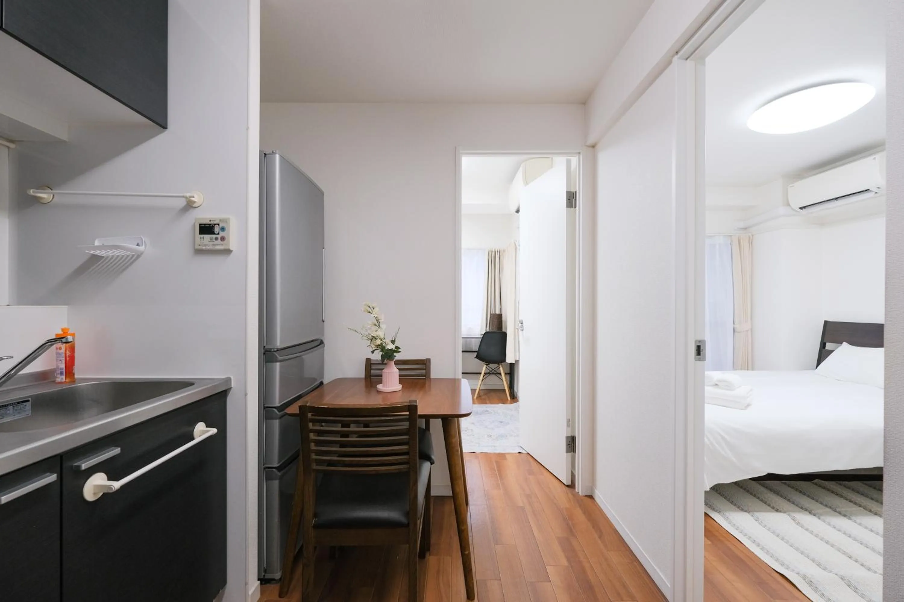 Kitchen or kitchenette, Bed in Ikebukuro La Rêve House