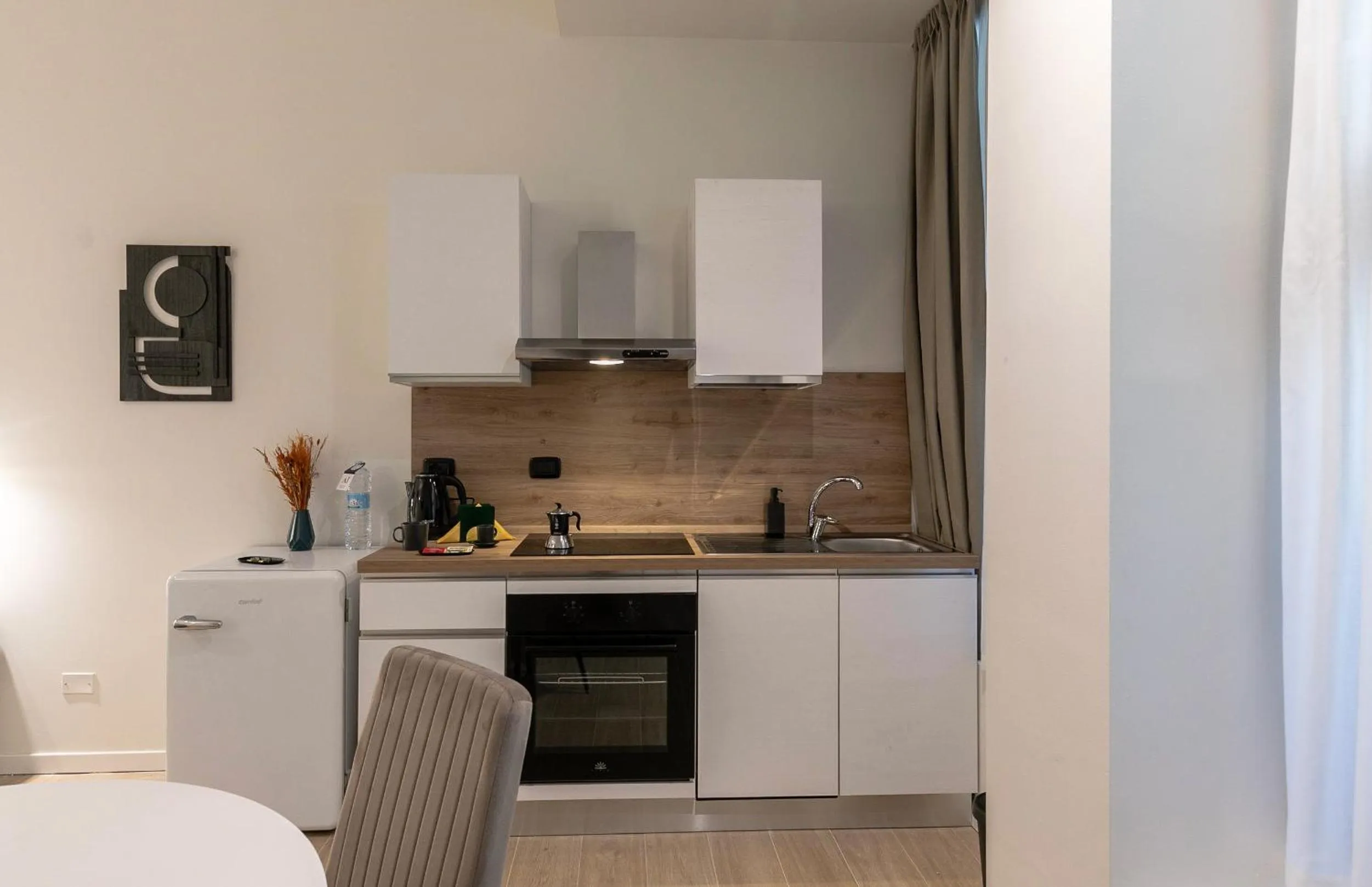 Kitchen or kitchenette in Aiello Hotels - CityLife Apartments