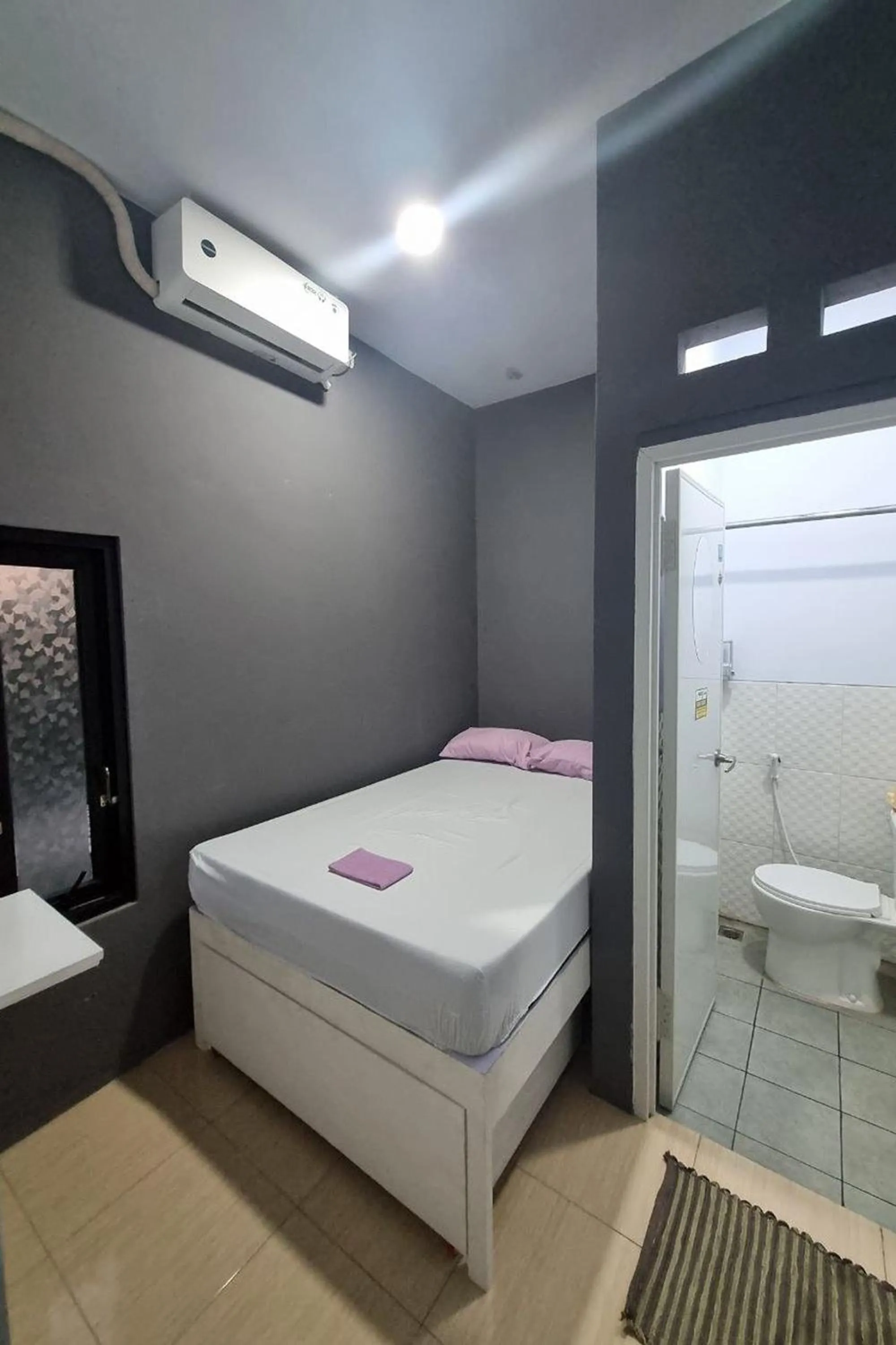 Bed in Ardafa Inn & Villa