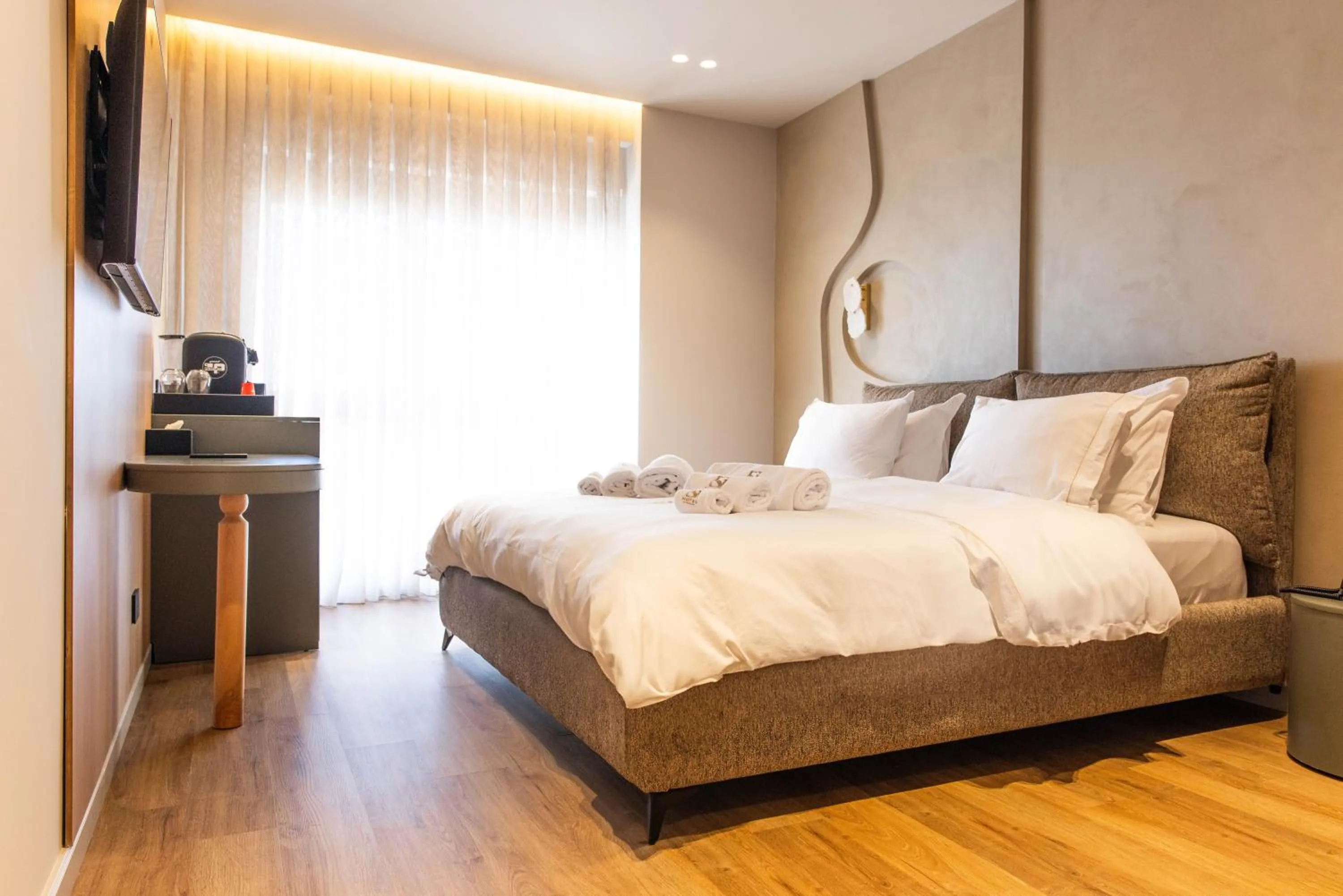 Bed in Si Hotel Tirana