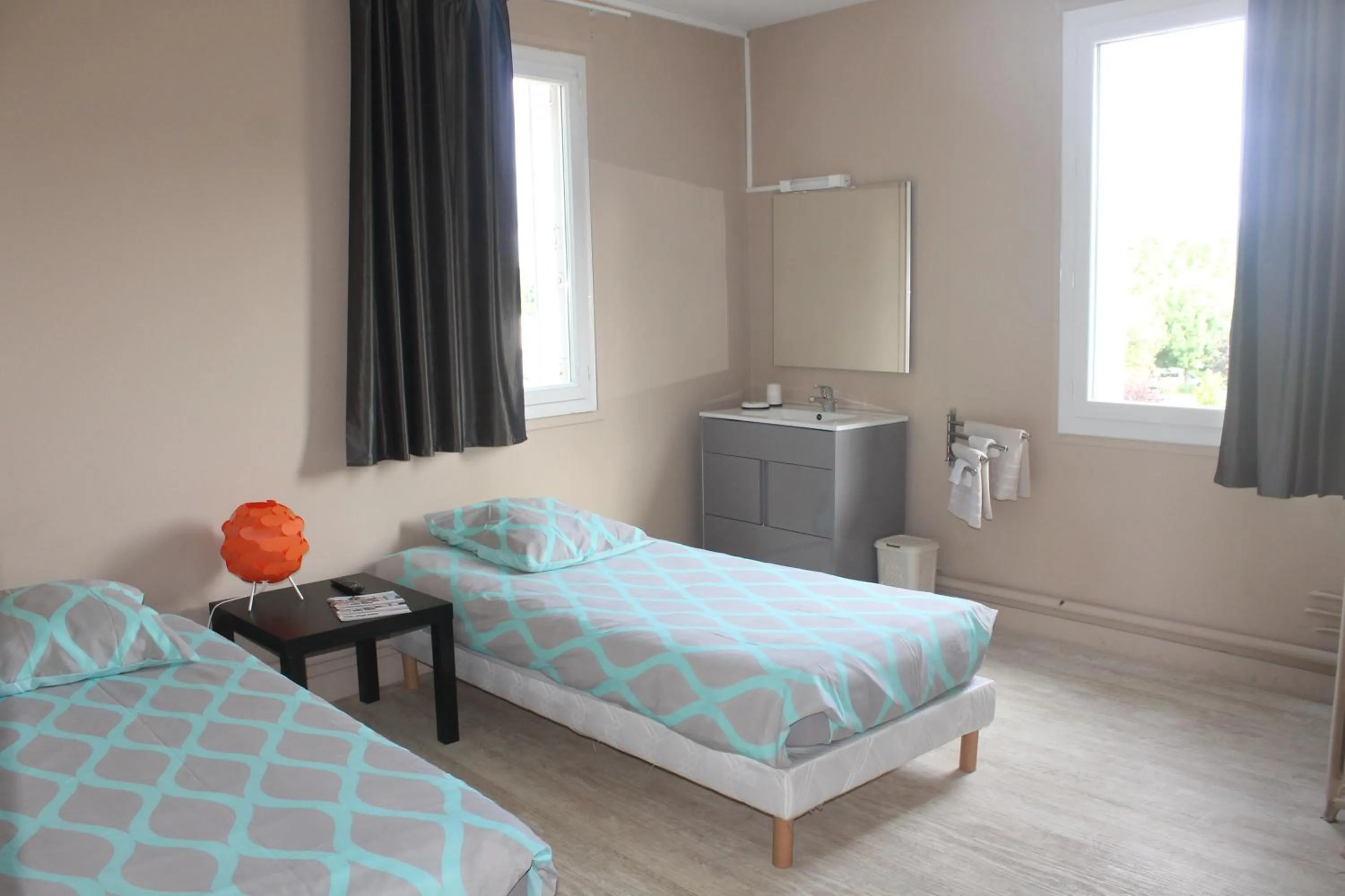 Bed in Le Bellevue Lisieux