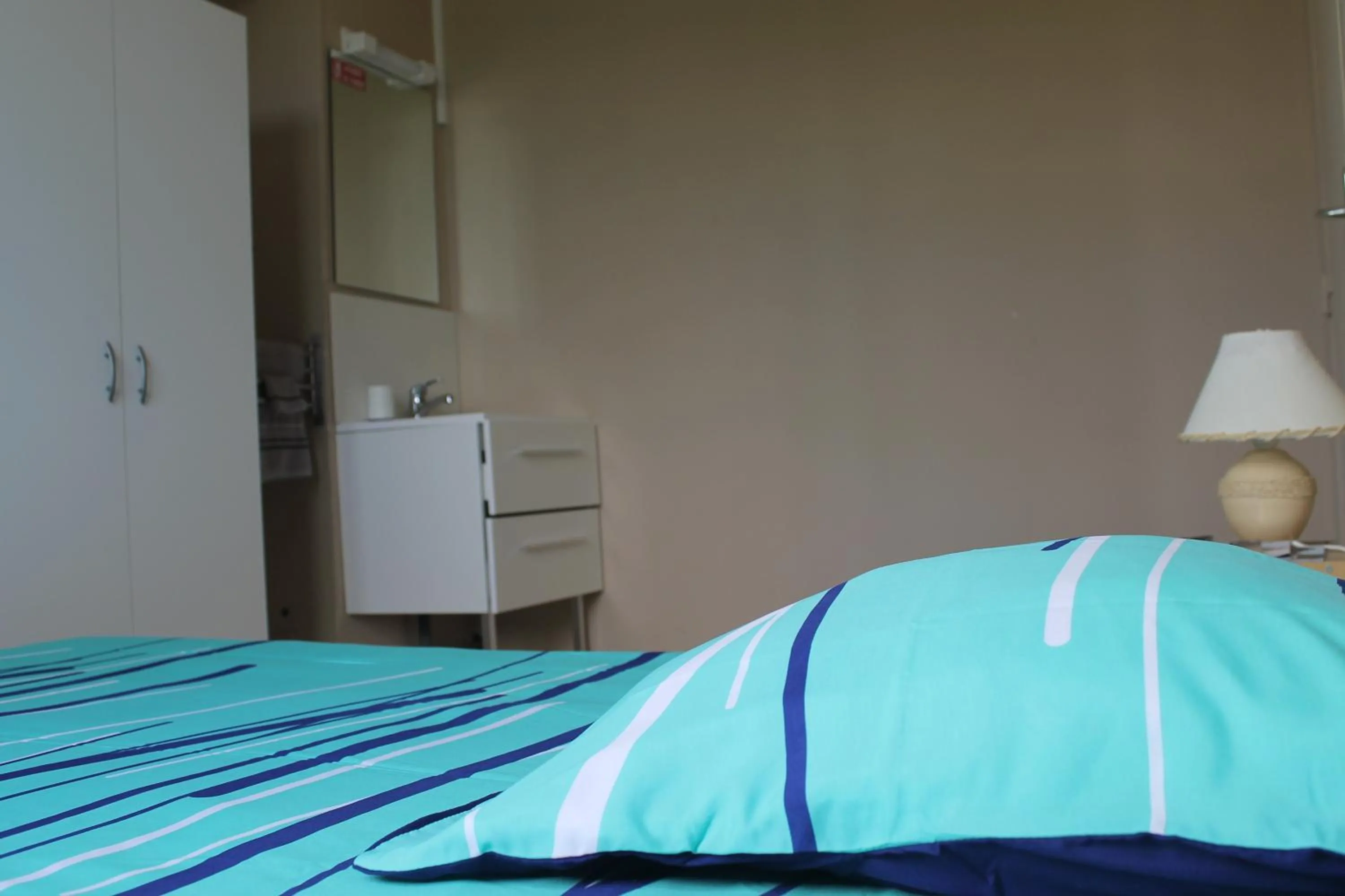 Bed in Le Bellevue Lisieux