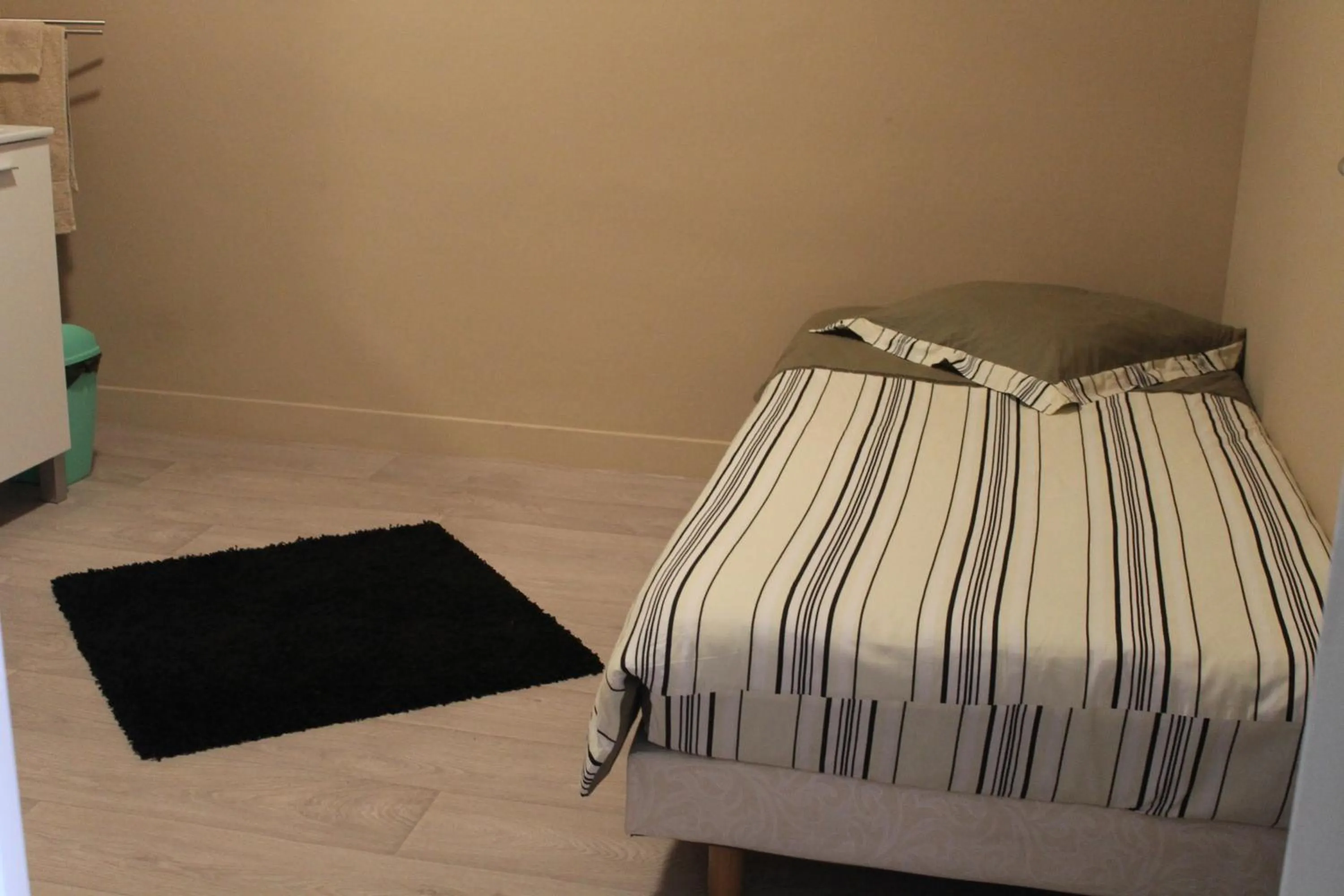 Bed in Le Bellevue Lisieux