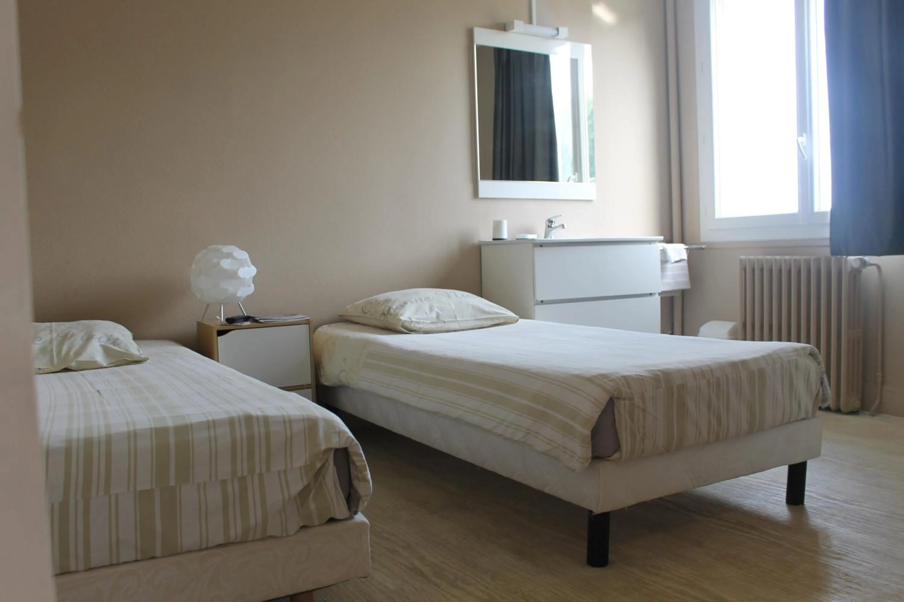 Bed in Le Bellevue Lisieux