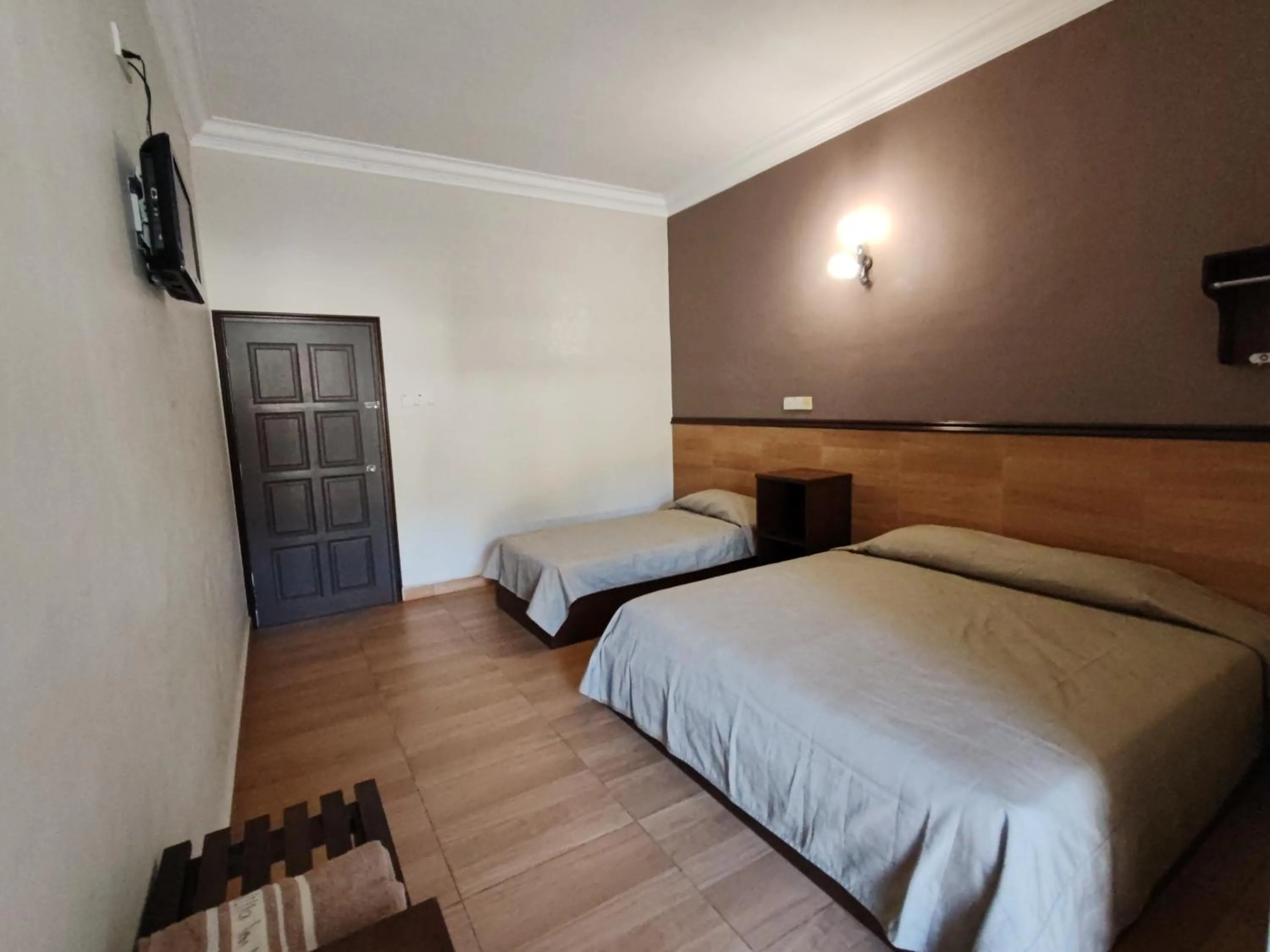 Bed in Lumut Villa Inn Homestay