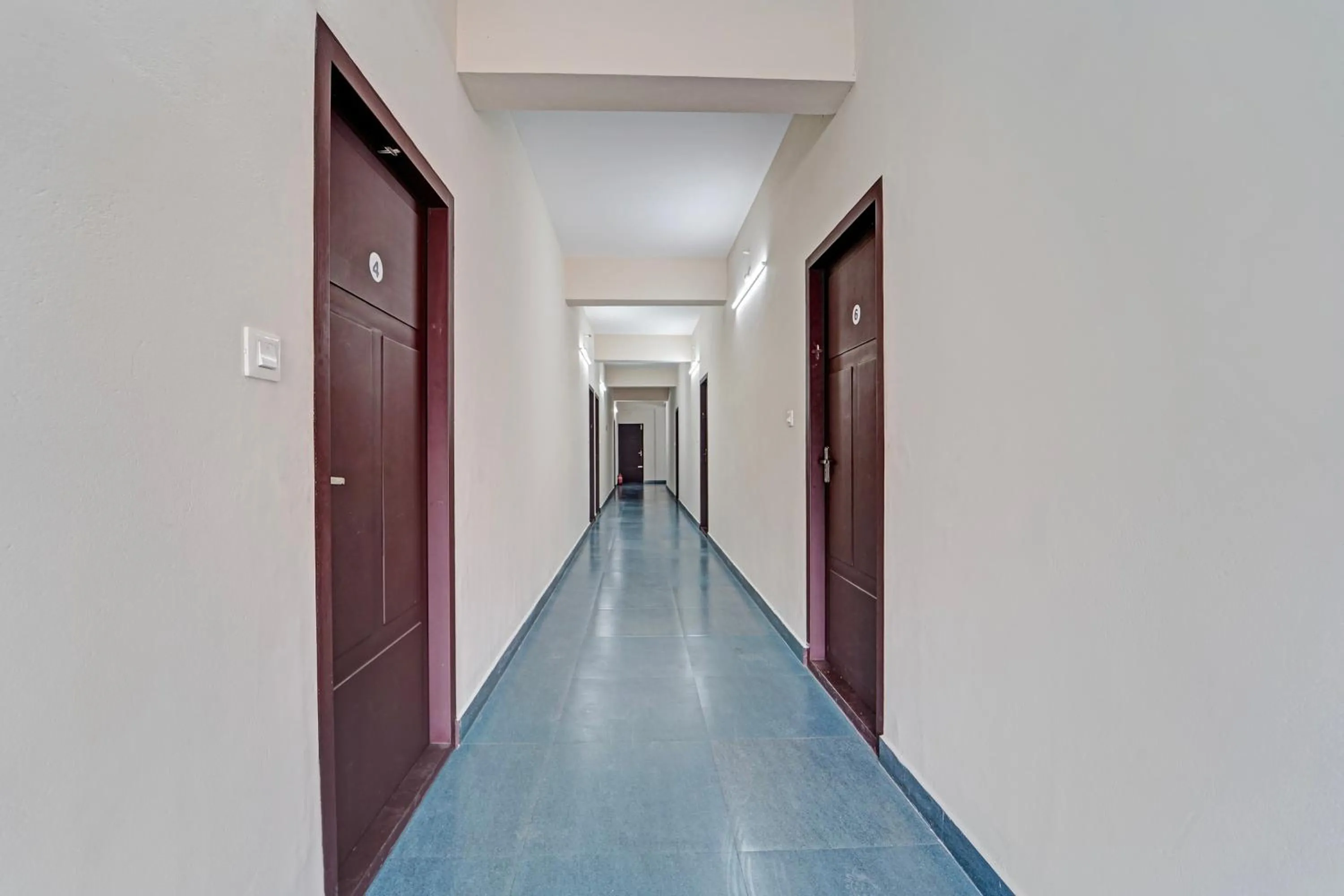 Hotel O Ambalamedu Puthenkurish Road