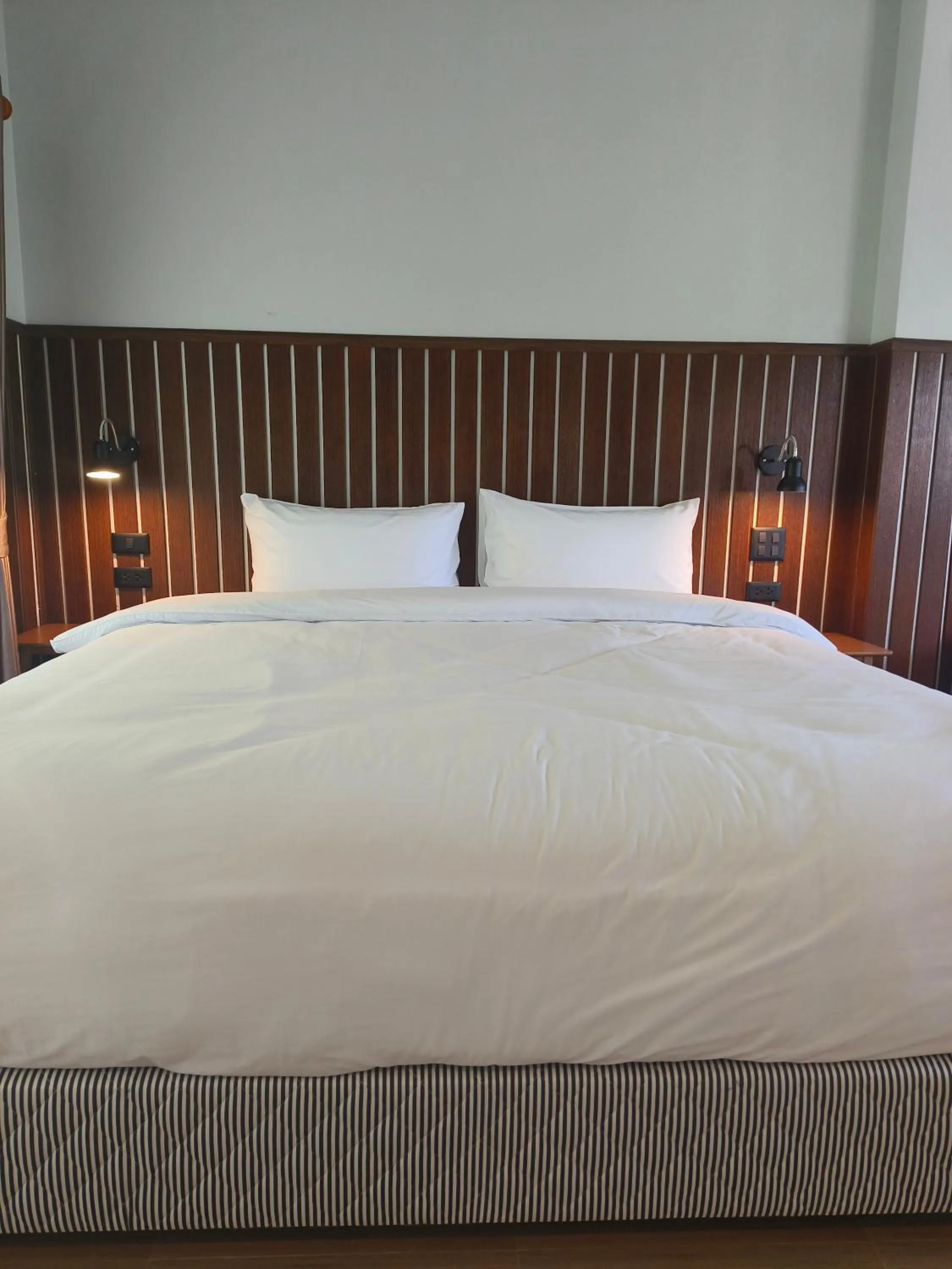 Bed in Mookies Bungalows