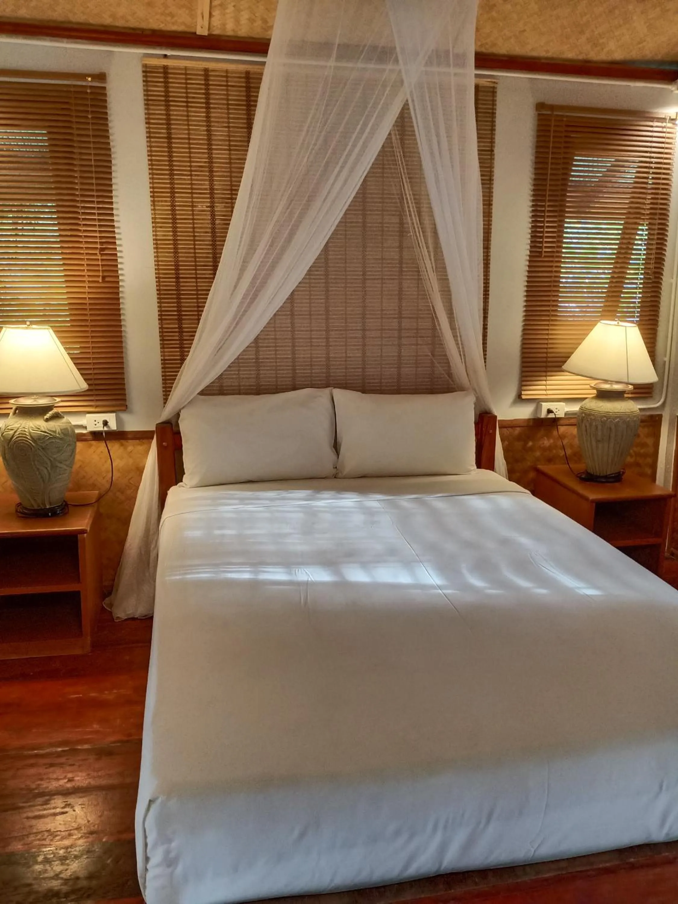 Bed in Mookies Bungalows