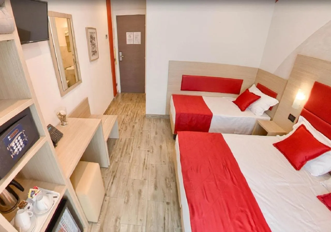 Bed in Hotel Luxor Florence