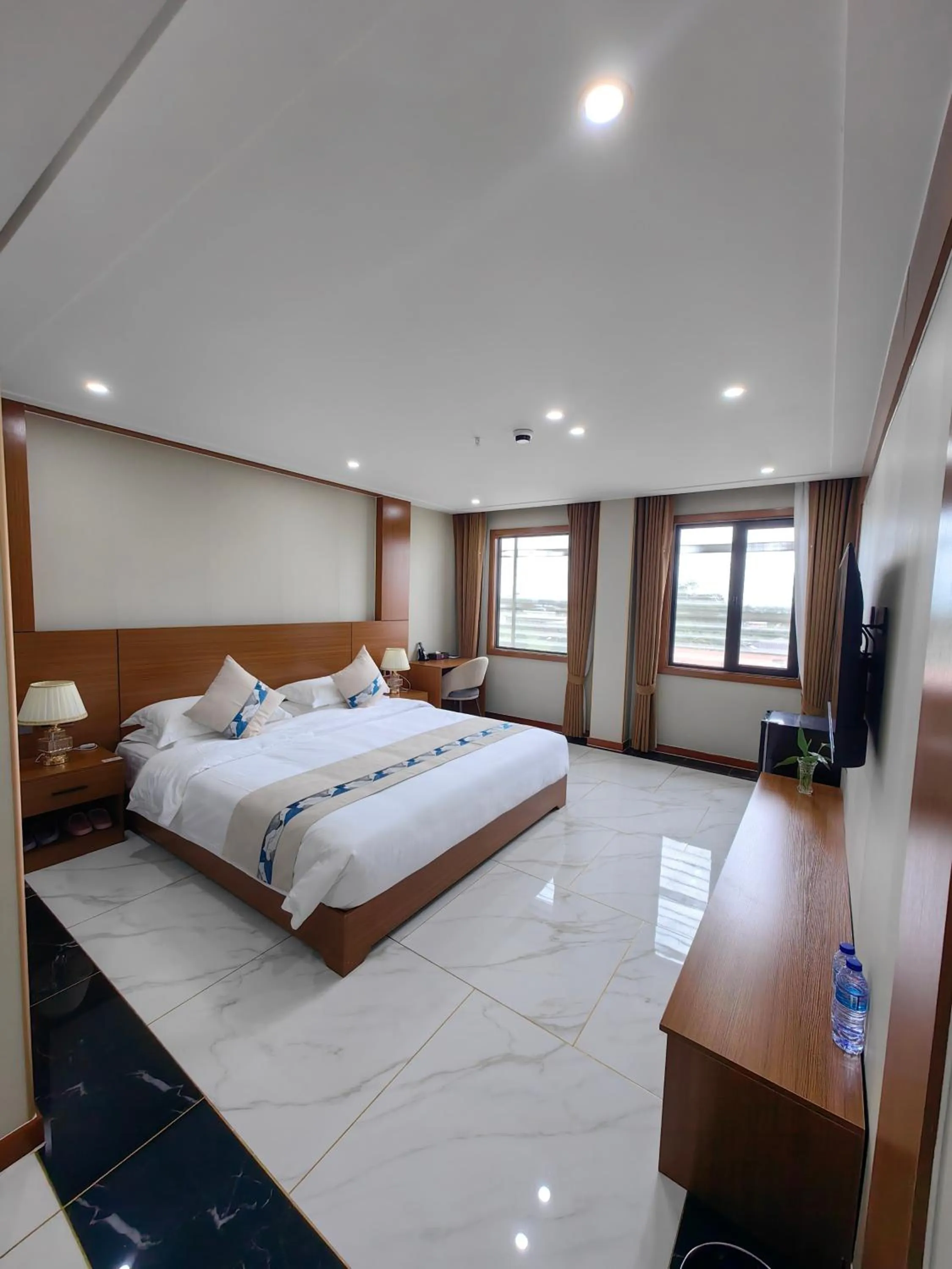 Bed in Royal International Hotel & Mall