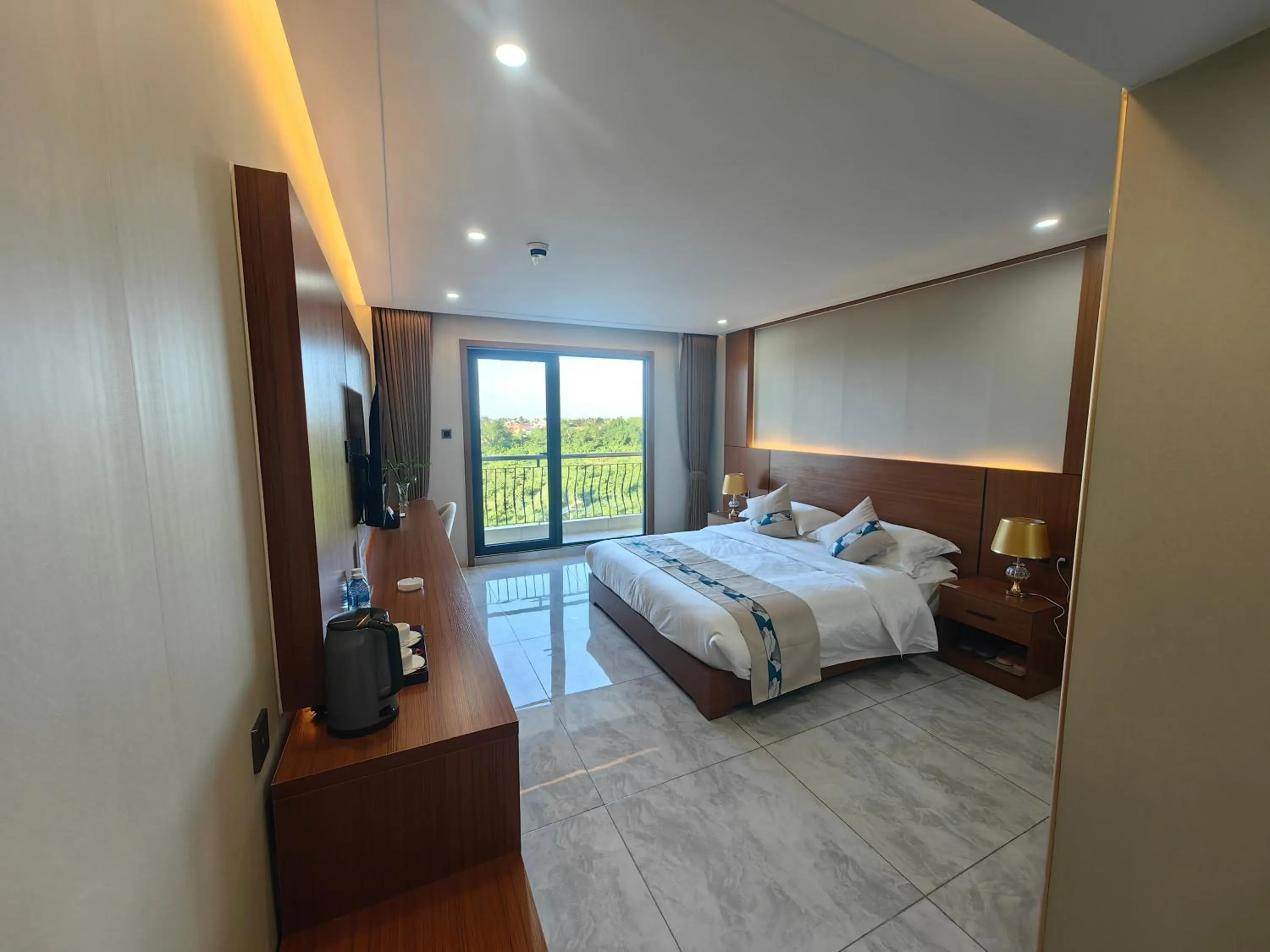 Bed in Royal International Hotel & Mall