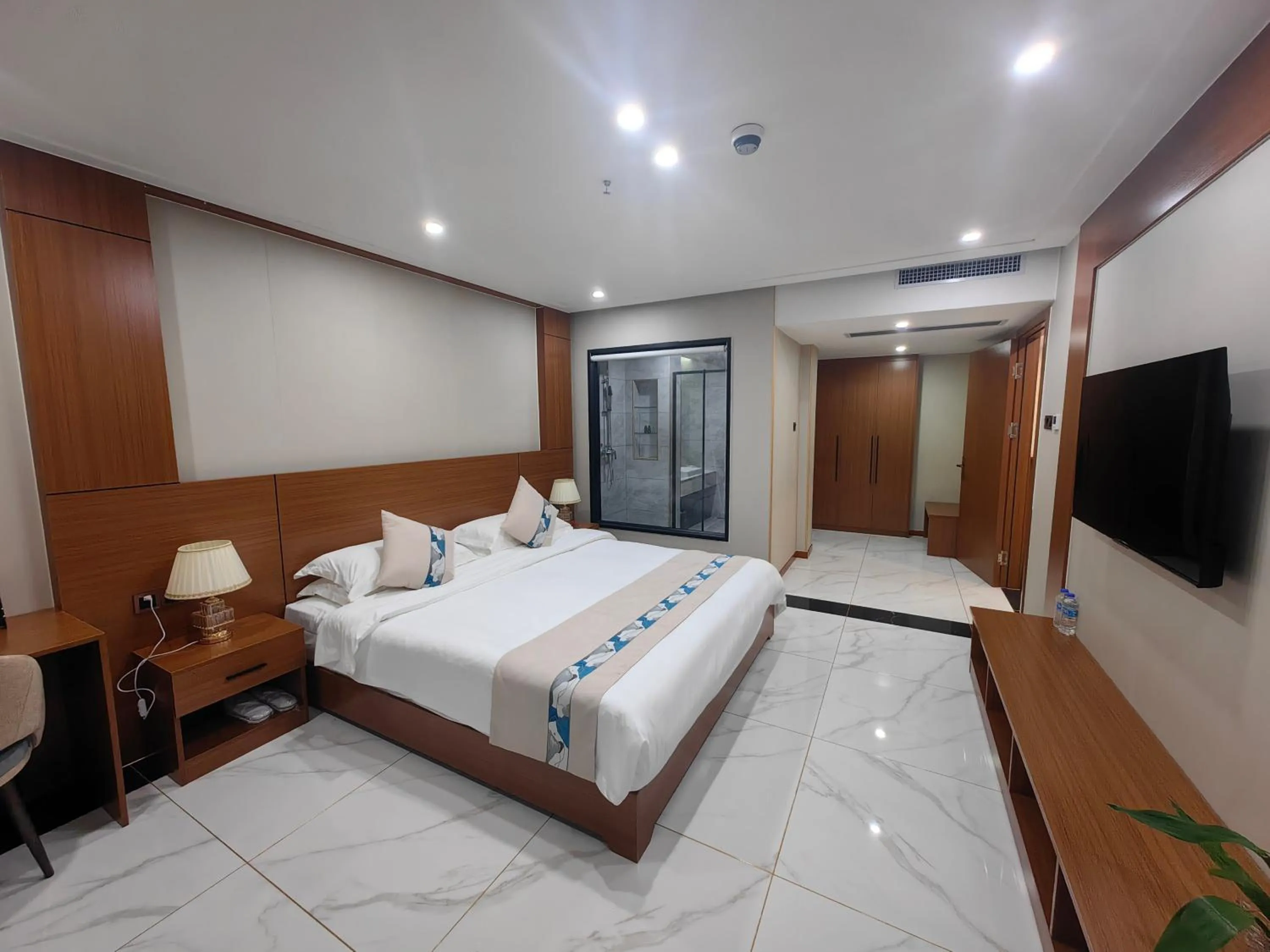 Bed in Royal International Hotel & Mall